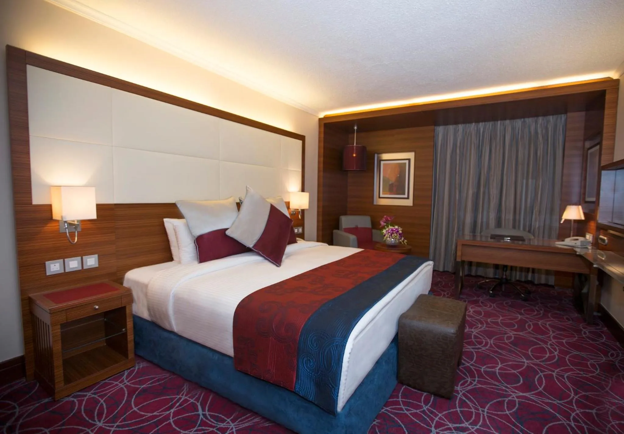 Photo of the whole room, Bed in Crowne Plaza Amman by IHG