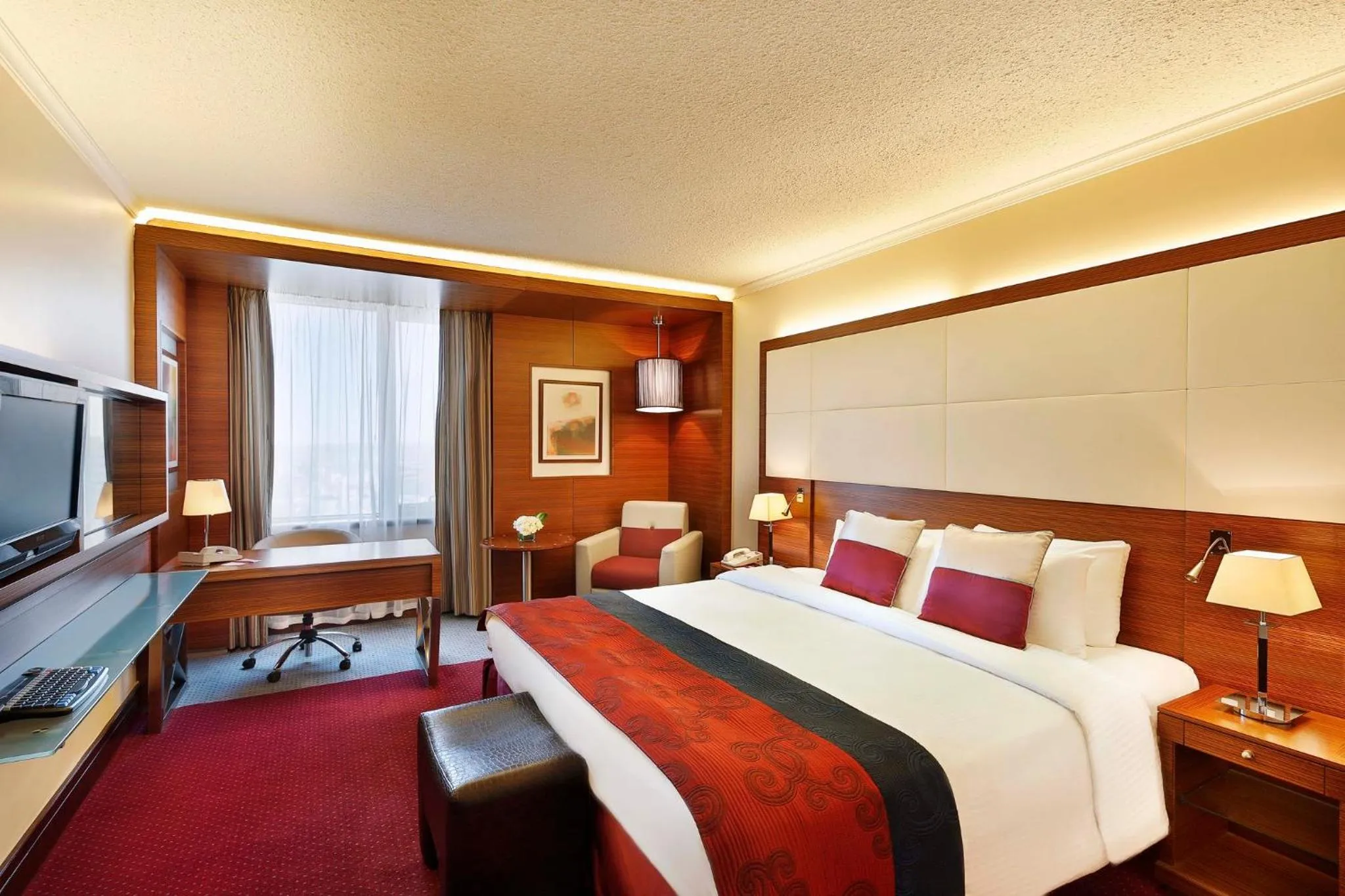 Photo of the whole room, Bed in Crowne Plaza Amman by IHG