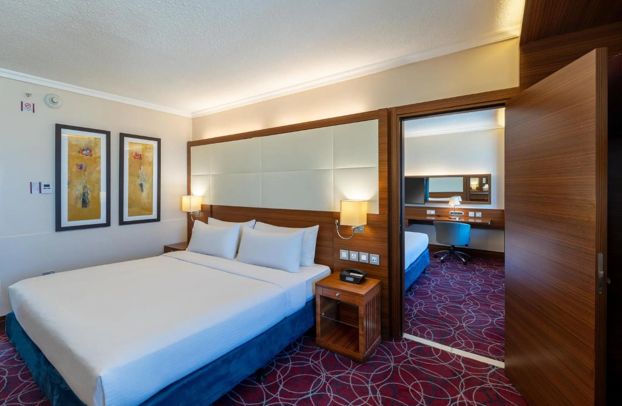 Photo of the whole room, Bed in Crowne Plaza Amman by IHG