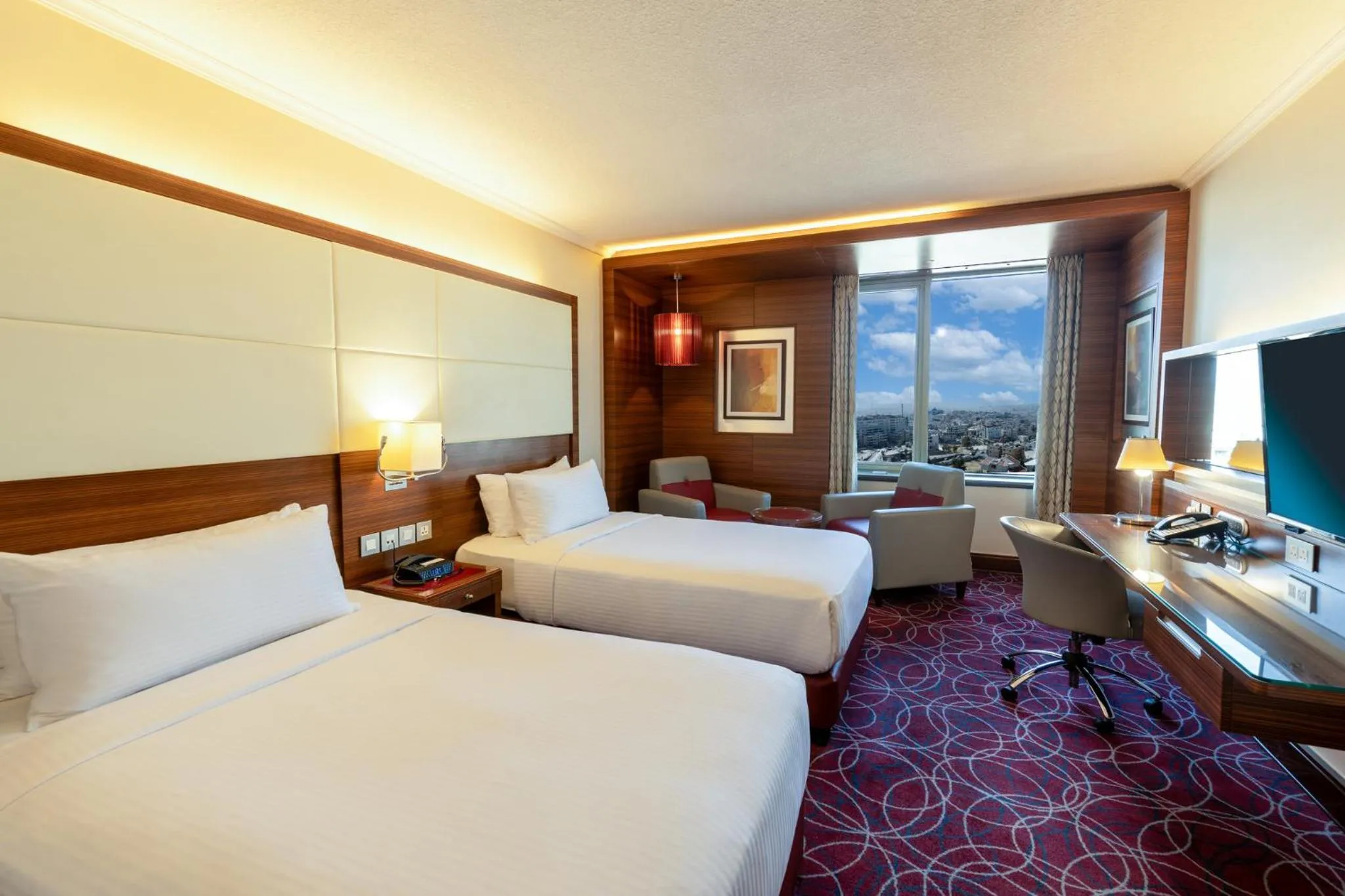 Photo of the whole room, Bed in Crowne Plaza Amman by IHG