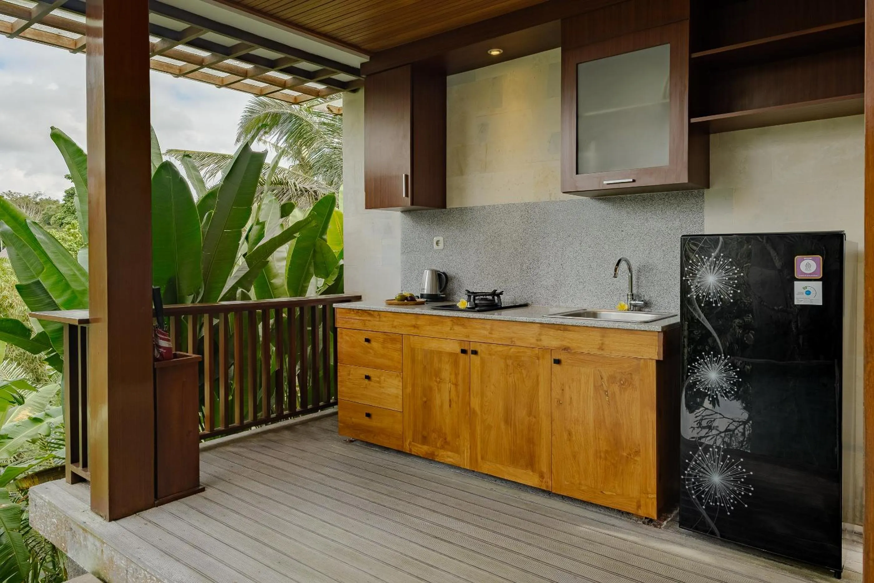 Kitchen or kitchenette in Yanyan Resort Ubud