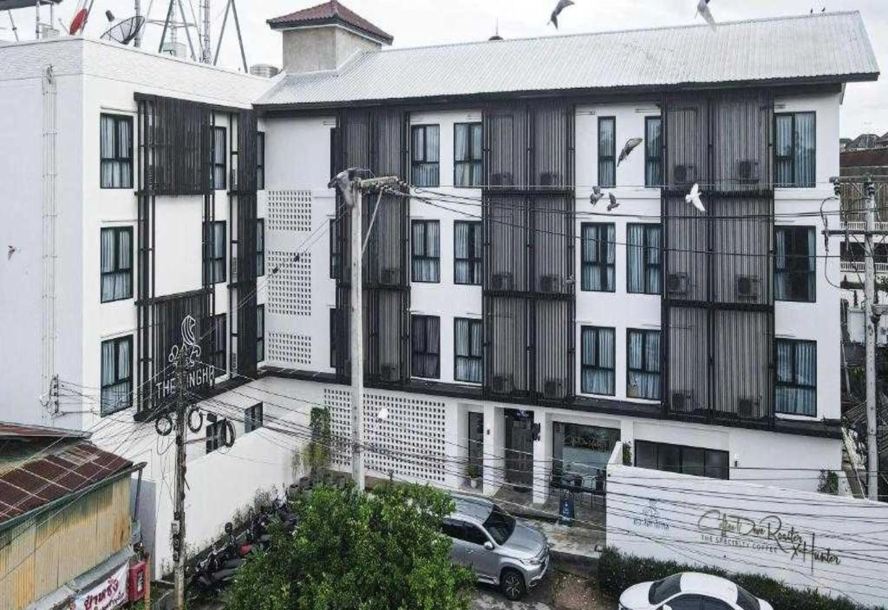 Property building in Collection O The Singha Chiangmai Hotel