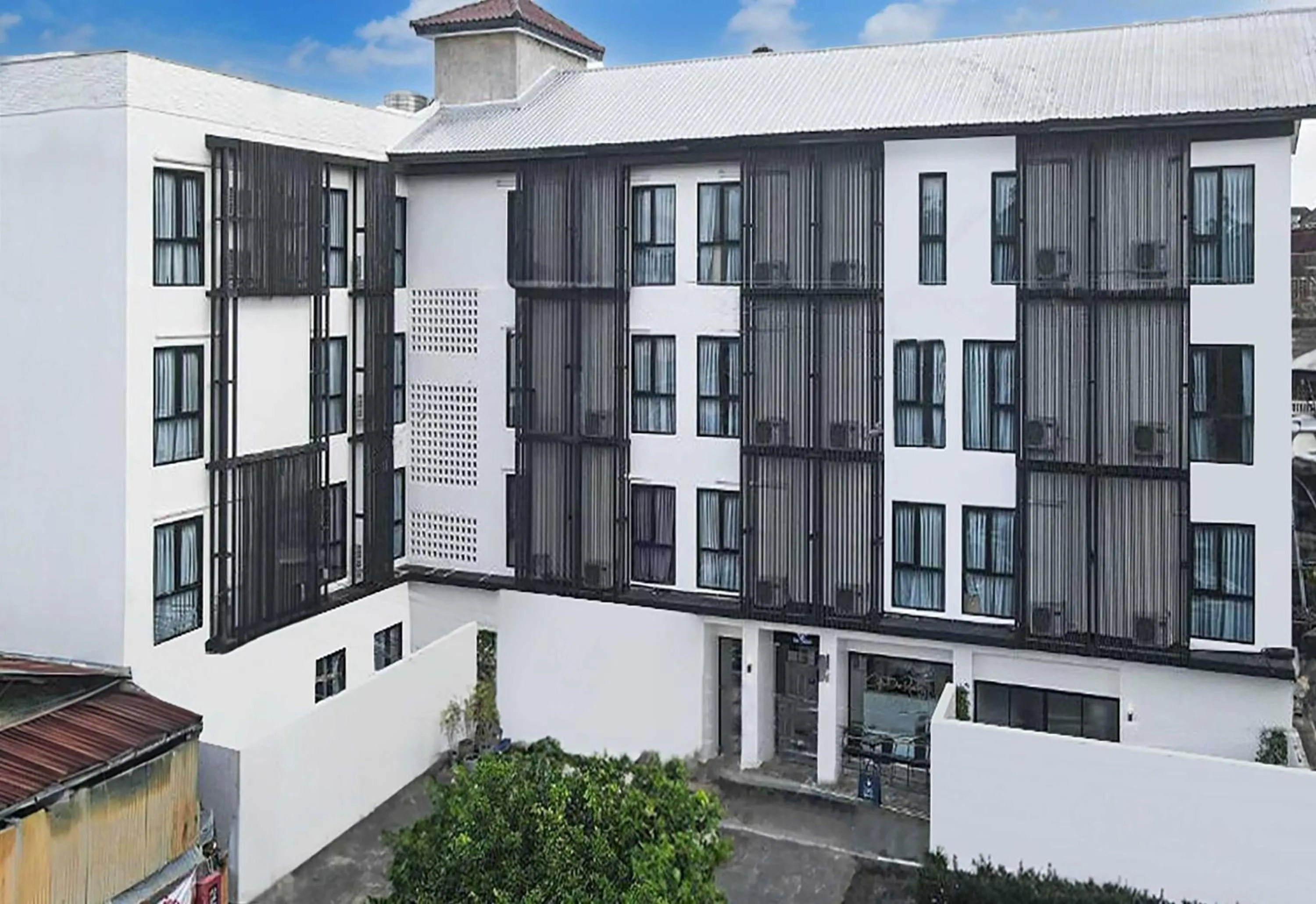 Property building in Collection O The Singha Chiangmai Hotel