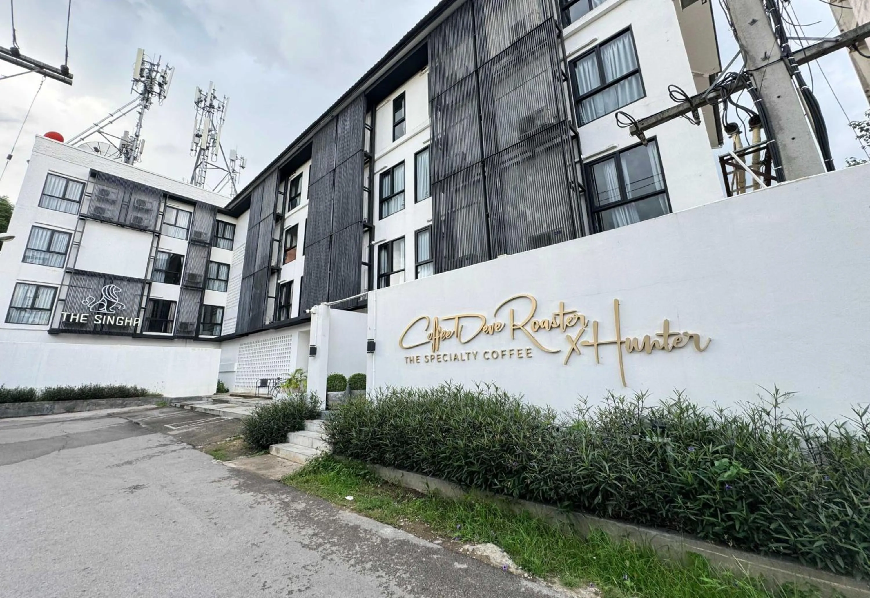 Property building in Collection O The Singha Chiangmai Hotel