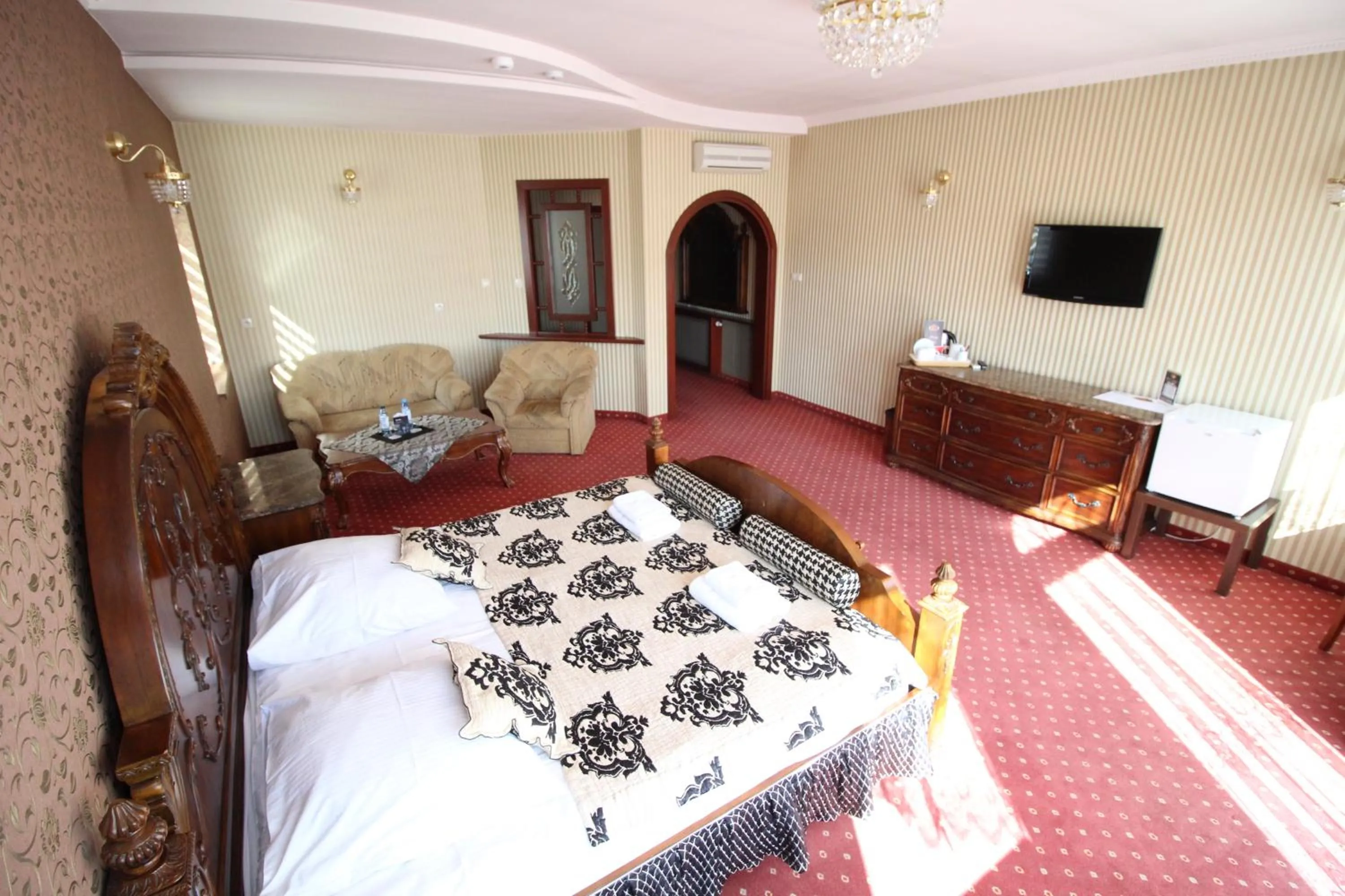 Communal lounge/ TV room, Bed in Złote Arkady