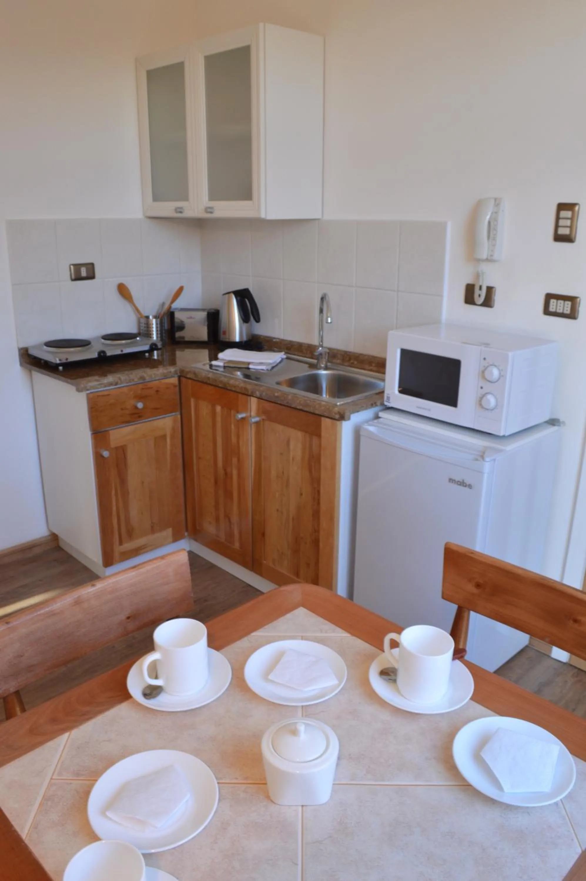 Kitchen or kitchenette in Apart Hotel Quillango