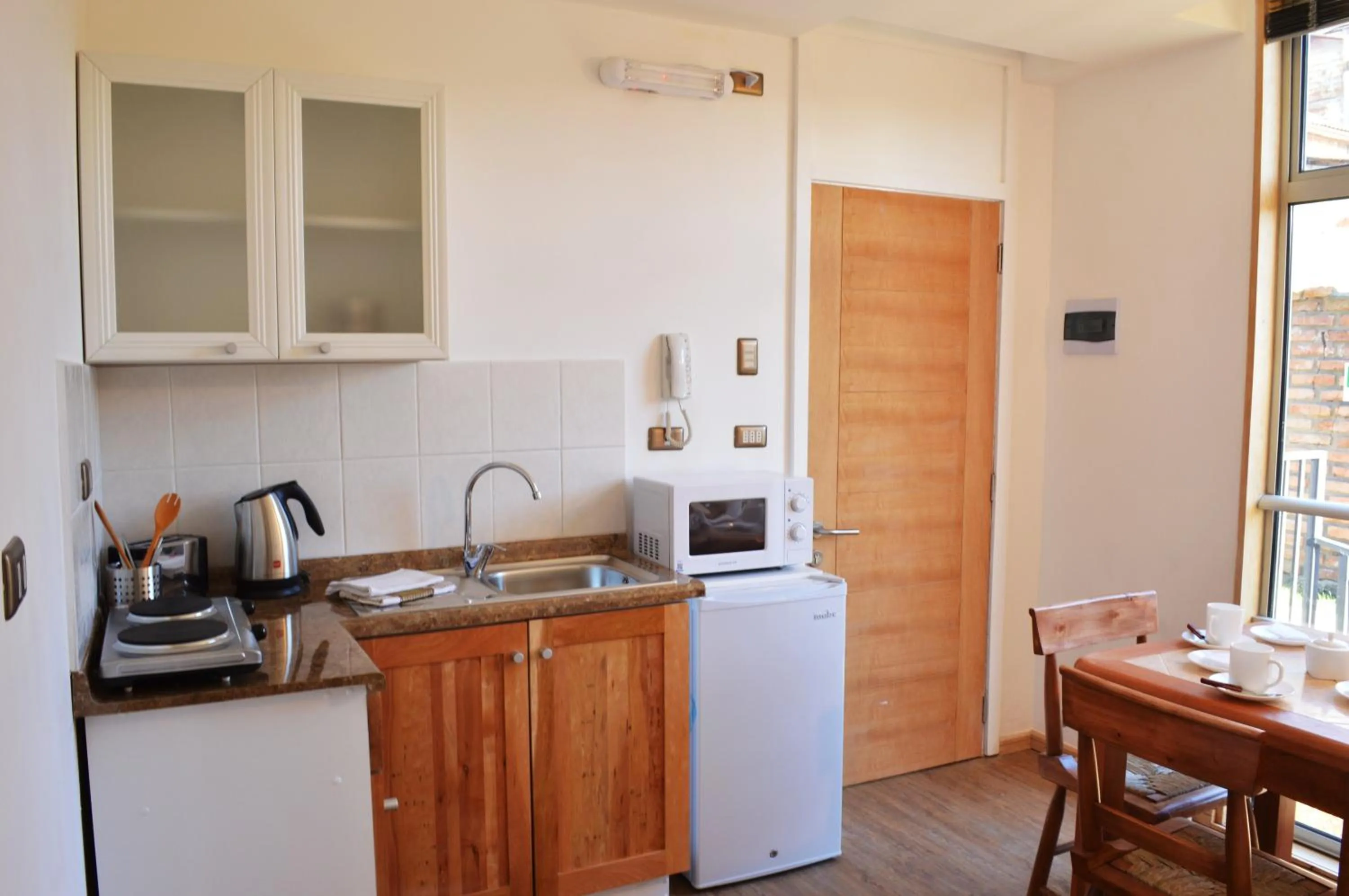 Kitchen or kitchenette in Apart Hotel Quillango