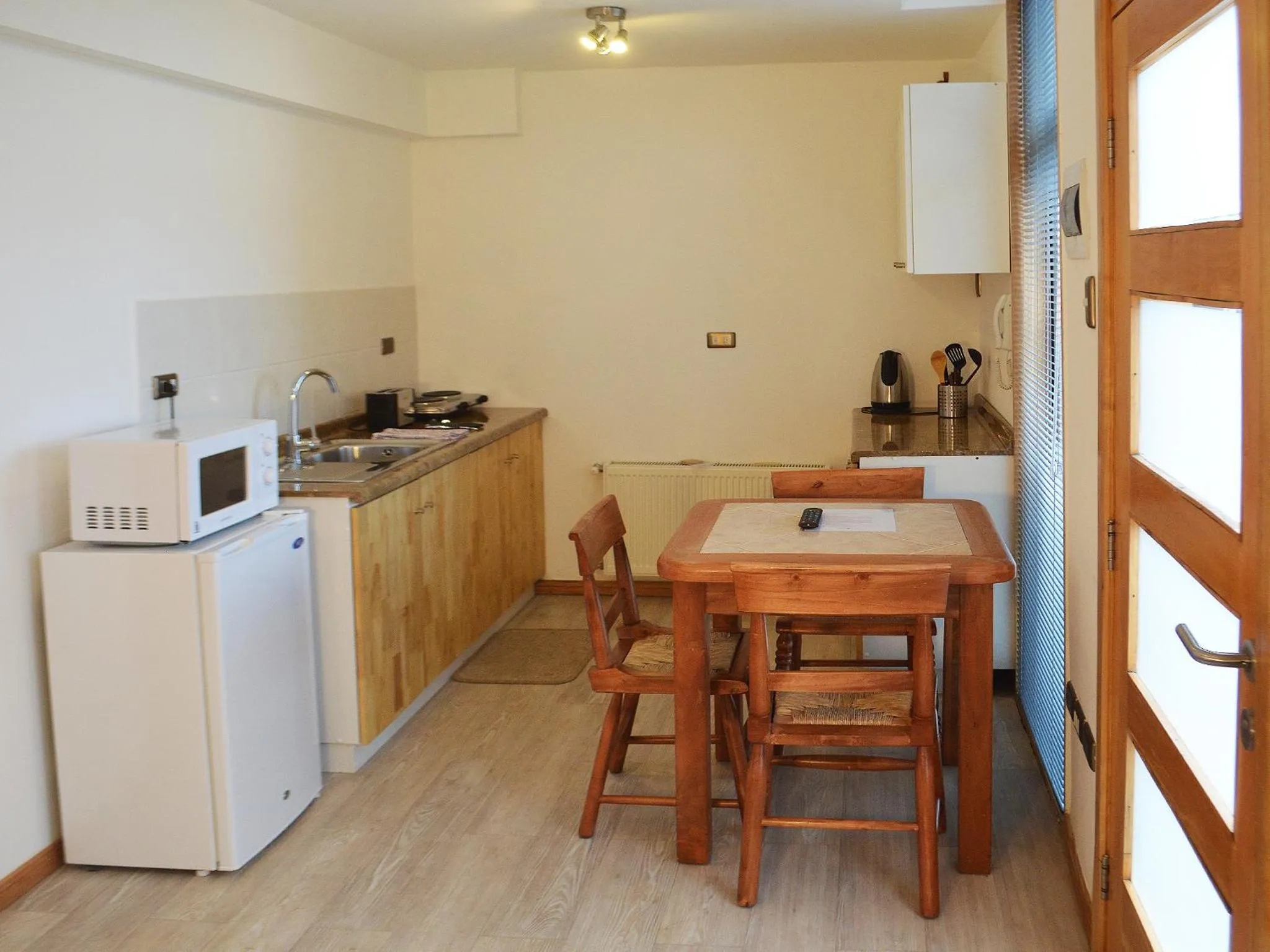 Kitchen or kitchenette in Apart Hotel Quillango