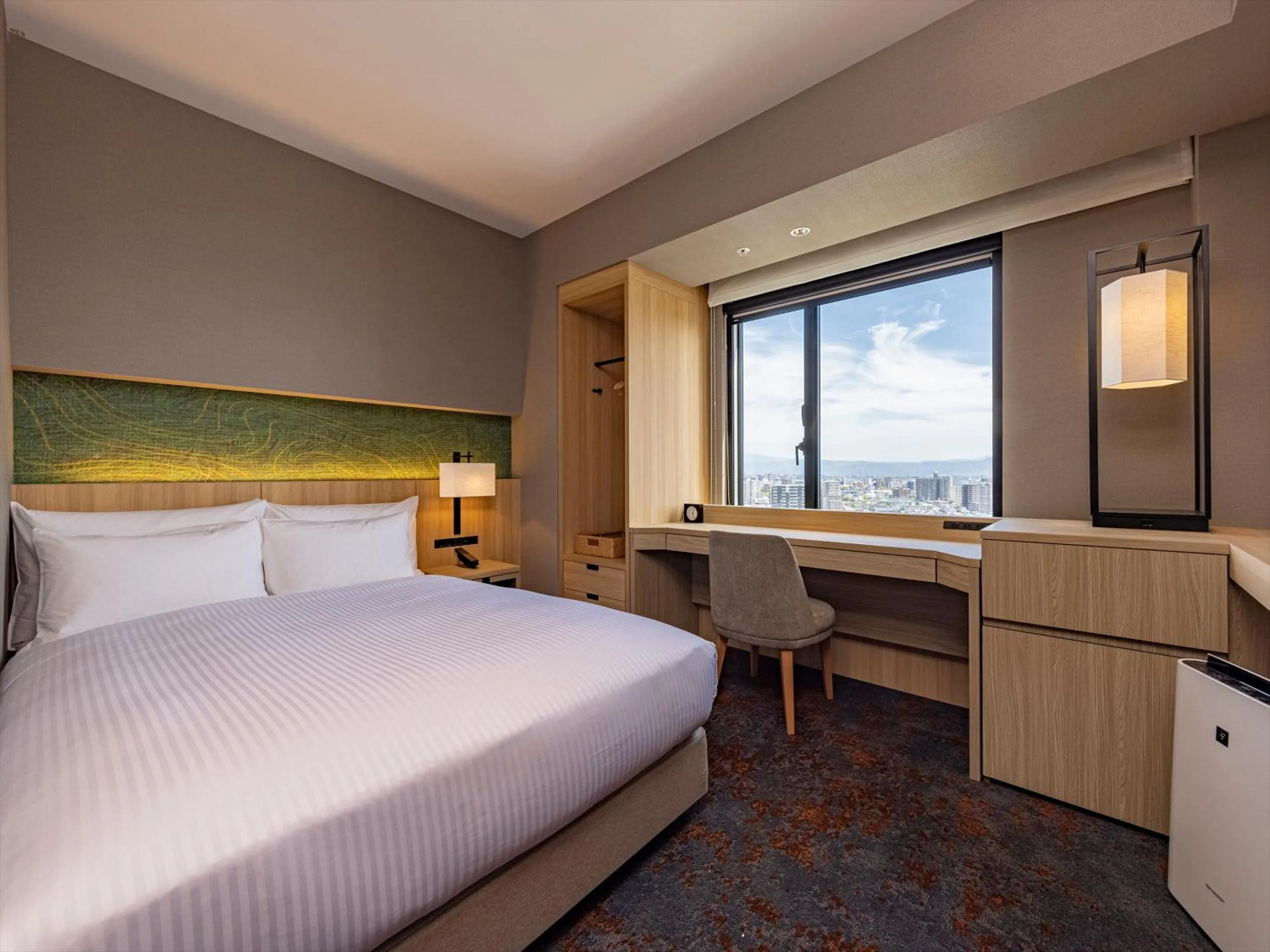 Bed in THE BLOSSOM KUMAMOTO