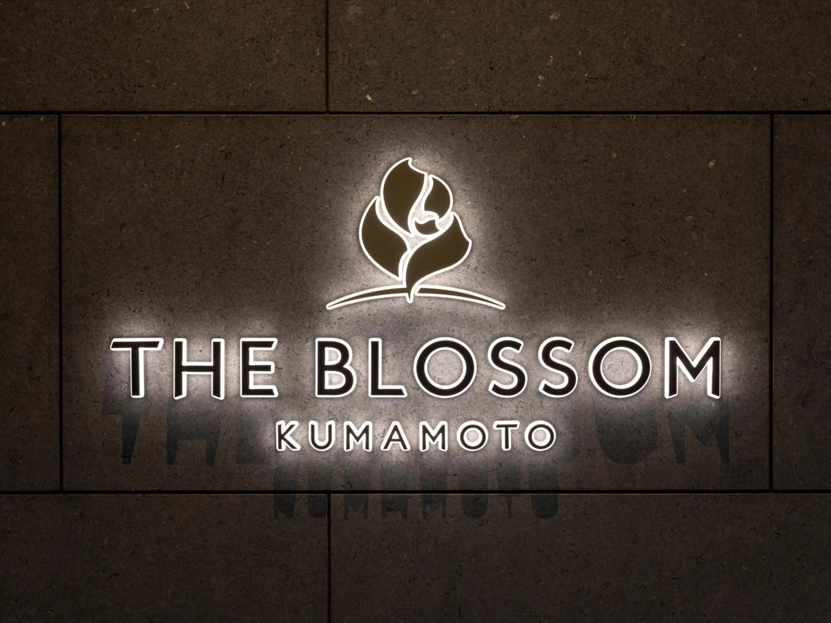 Property logo or sign in THE BLOSSOM KUMAMOTO