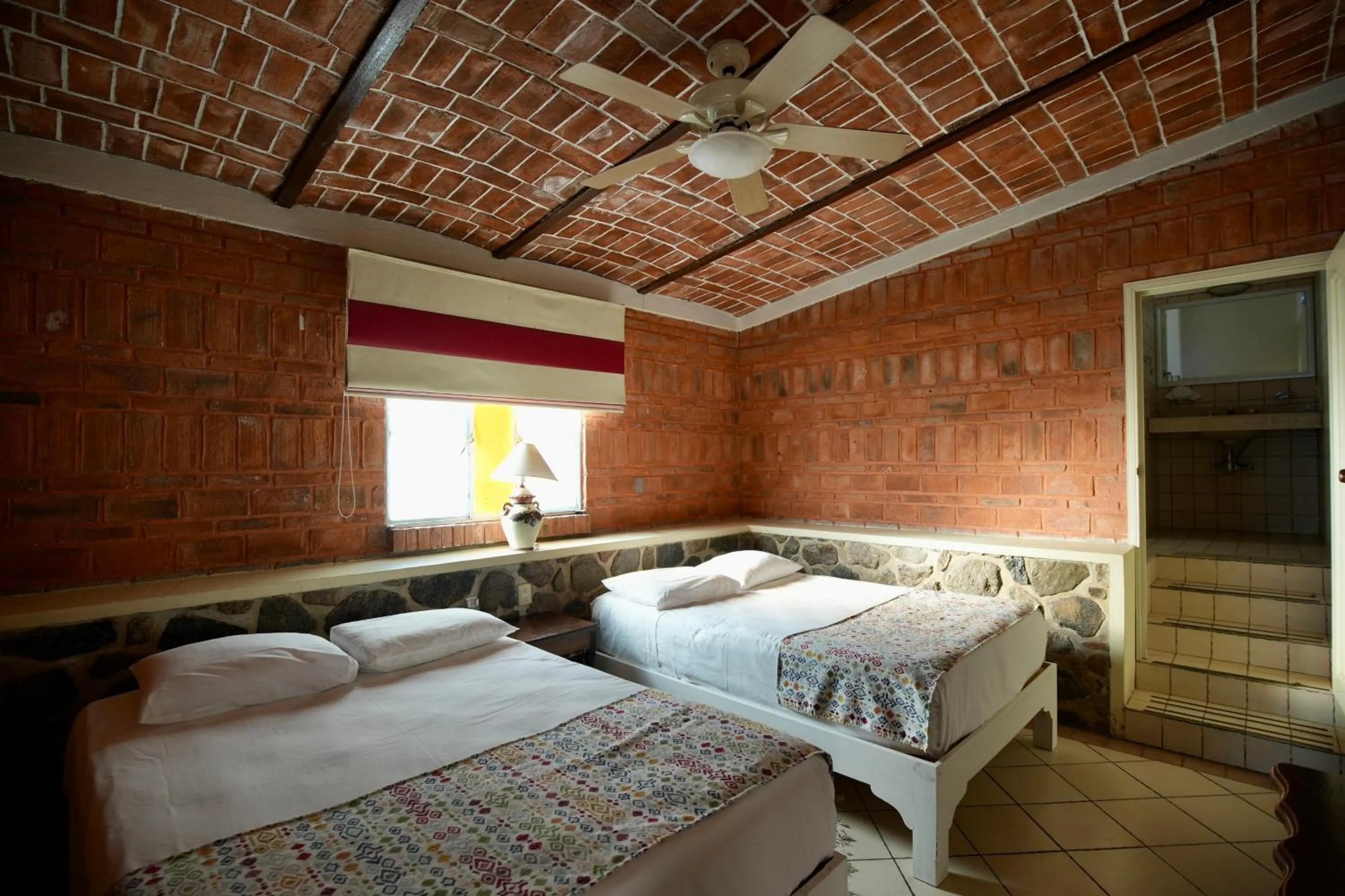 Bed in Mama Chuy Hotel & Villas Ajijic