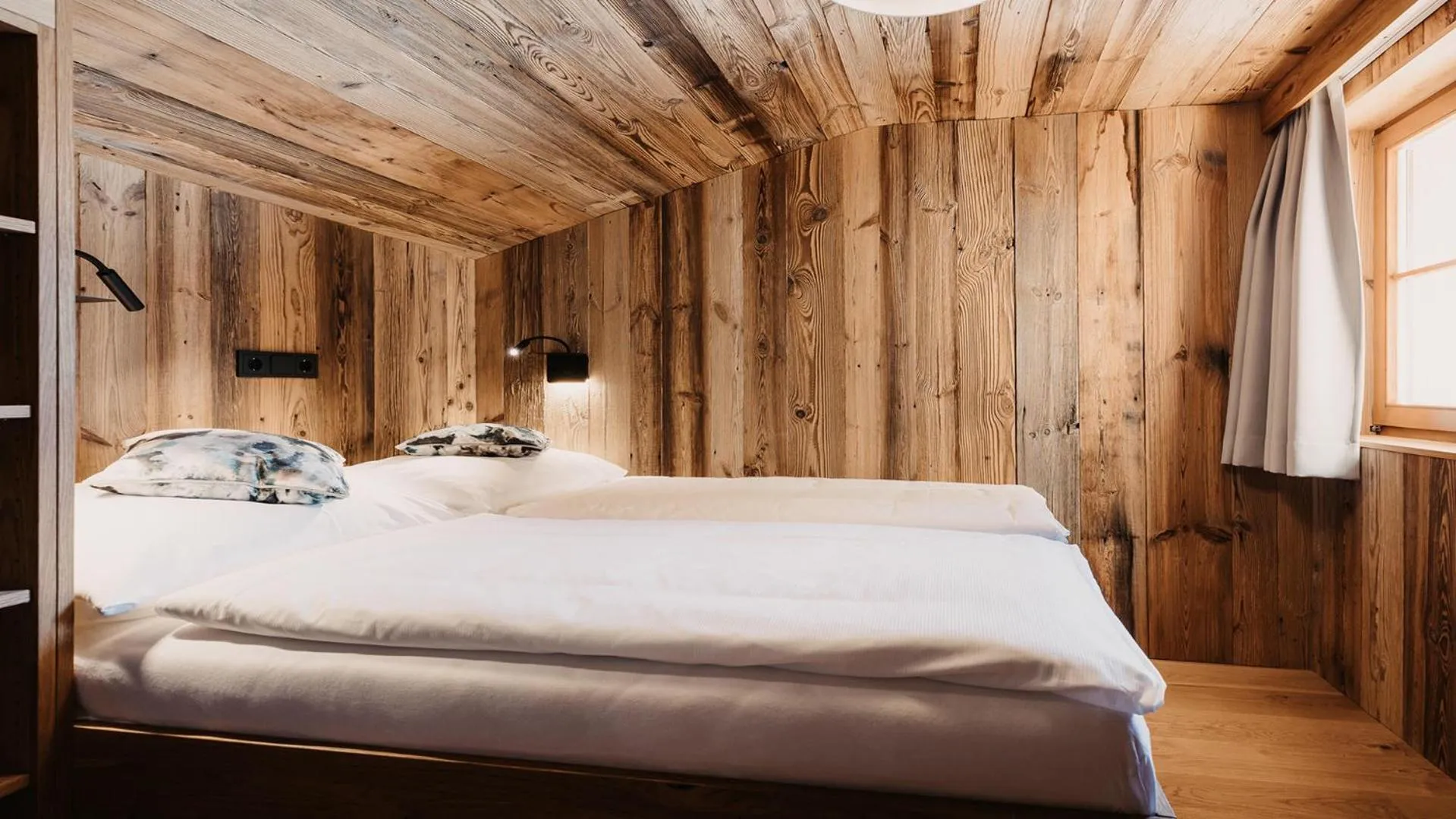 Bed in Hofgut Apartment & Lifestyle Resort Wagrain