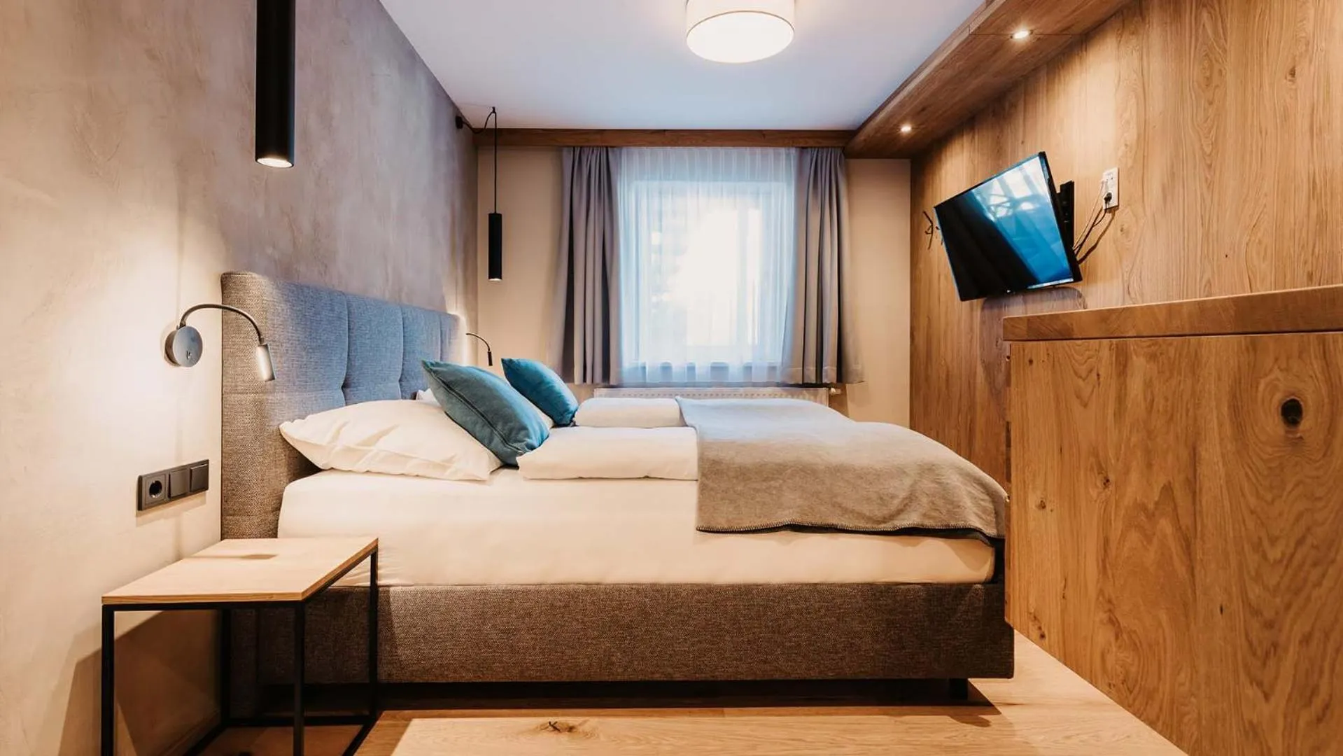 Bedroom, Bed in Hofgut Apartment & Lifestyle Resort Wagrain