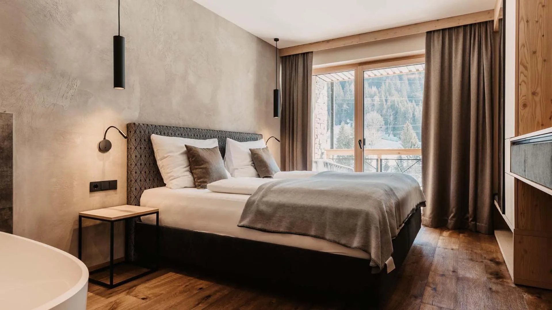 Bed in Hofgut Apartment & Lifestyle Resort Wagrain
