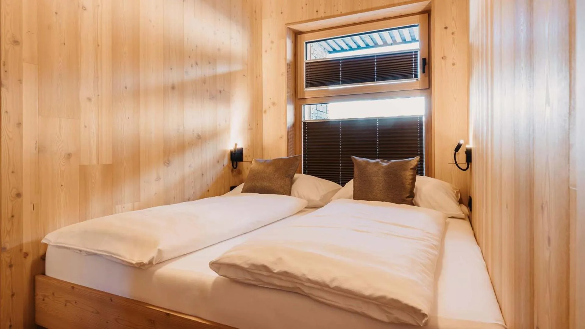 Bed in Hofgut Apartment & Lifestyle Resort Wagrain