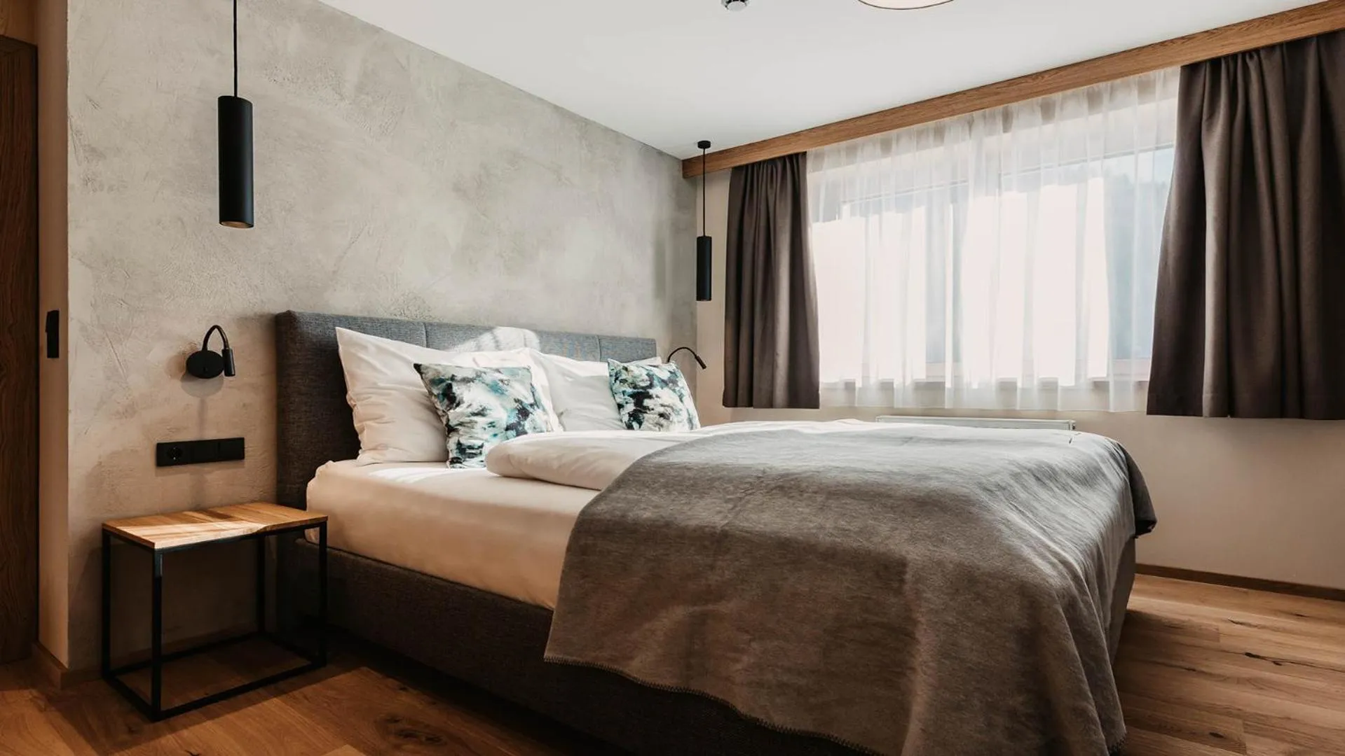Bed in Hofgut Apartment & Lifestyle Resort Wagrain
