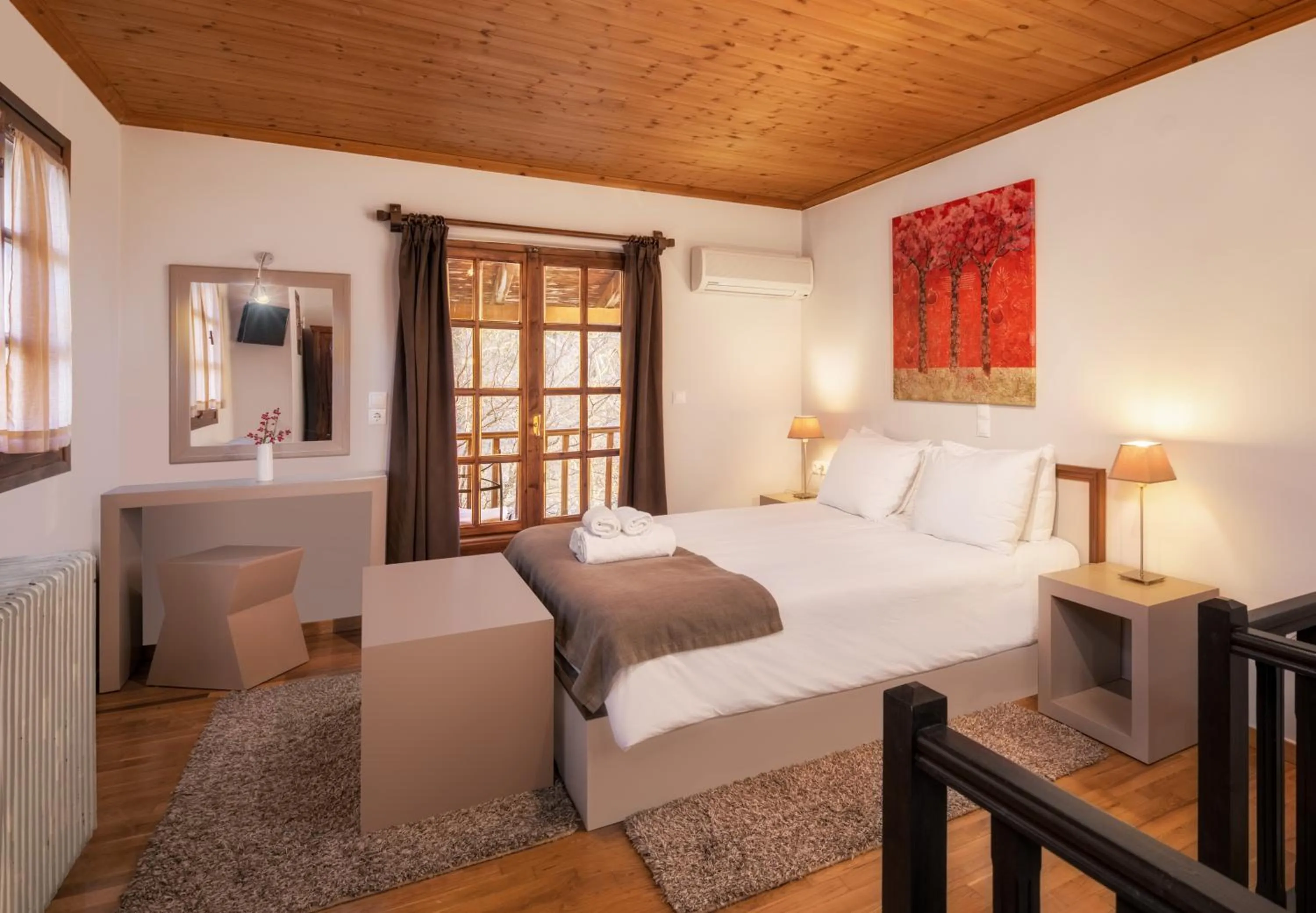 Bed in Κonitsa Gefyri hotel