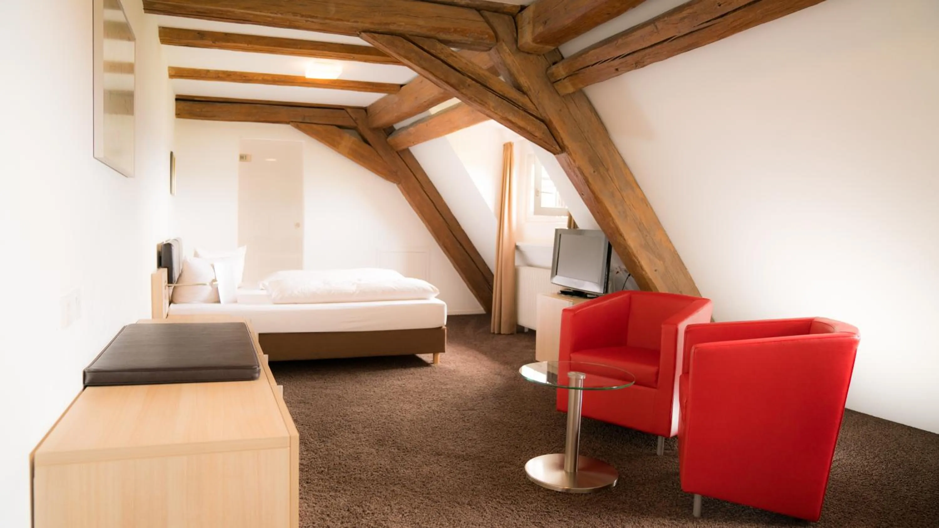 Photo of the whole room, Bed in Hotel Hofgut Hohenkarpfen