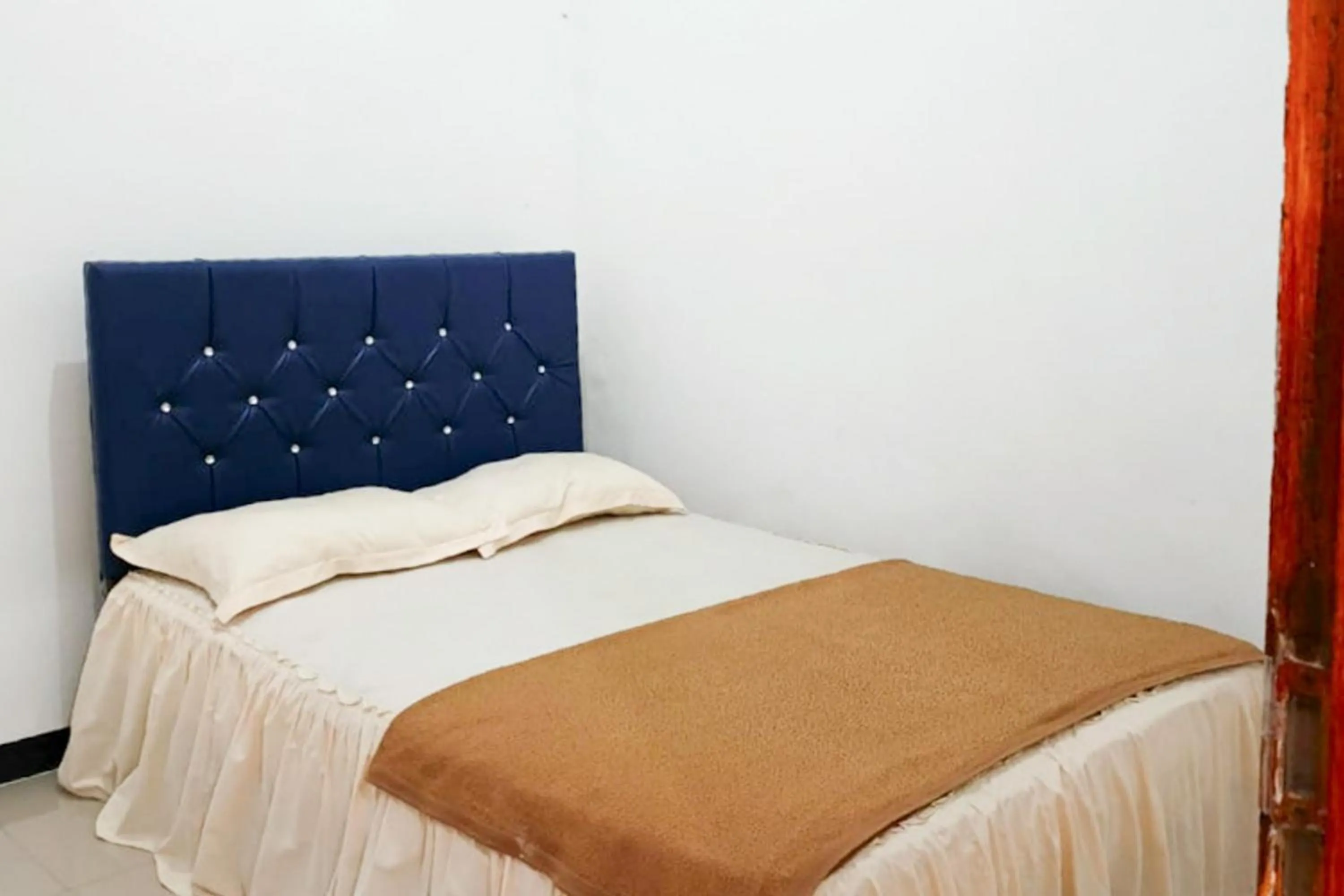 Bedroom, Bed in Villa Kampoeng City Pacet Mitra RedDoorz