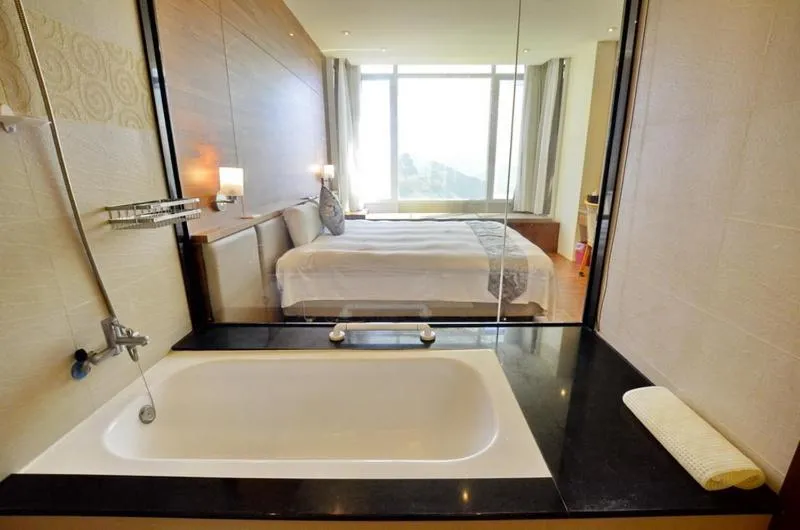 Bed in Jun Yue Hanging Garden Resort