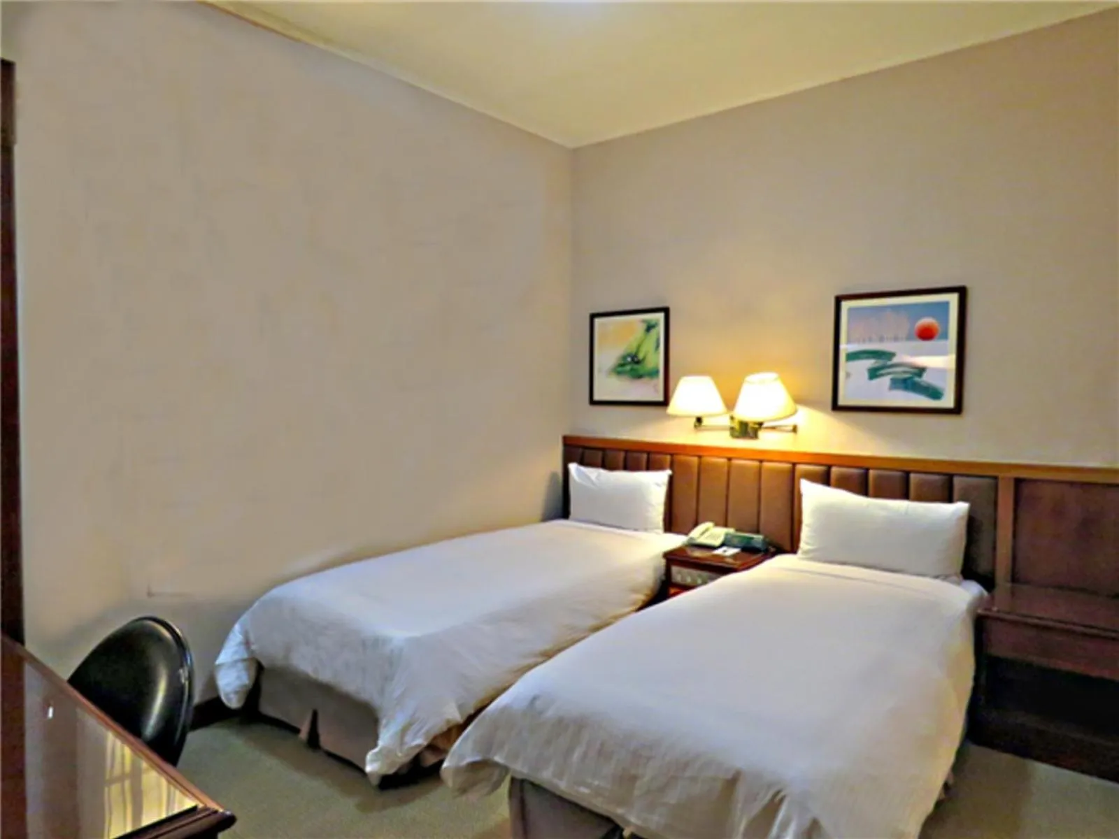 Photo of the whole room, Bed in First Hotel