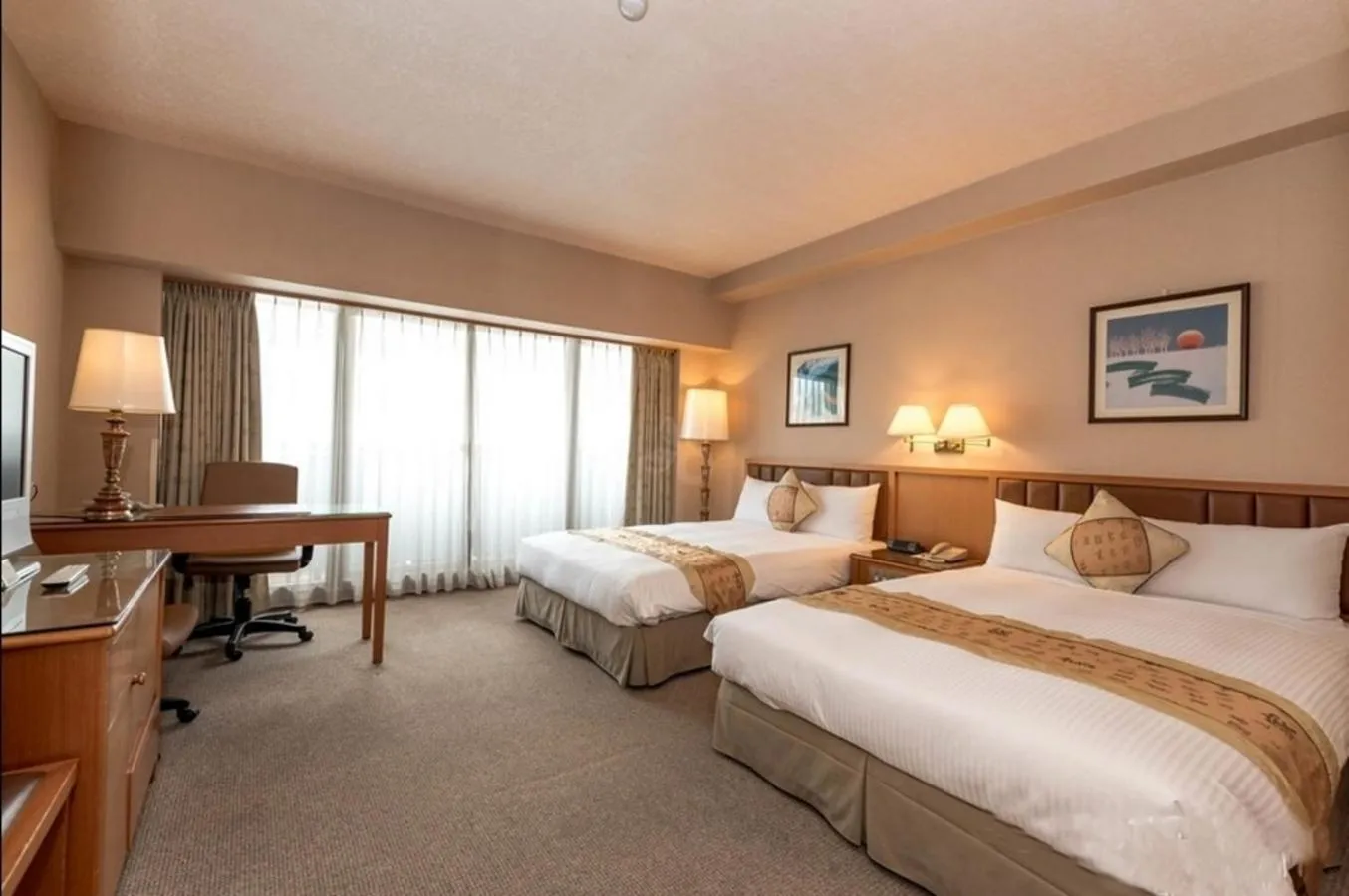 Photo of the whole room, Bed in First Hotel