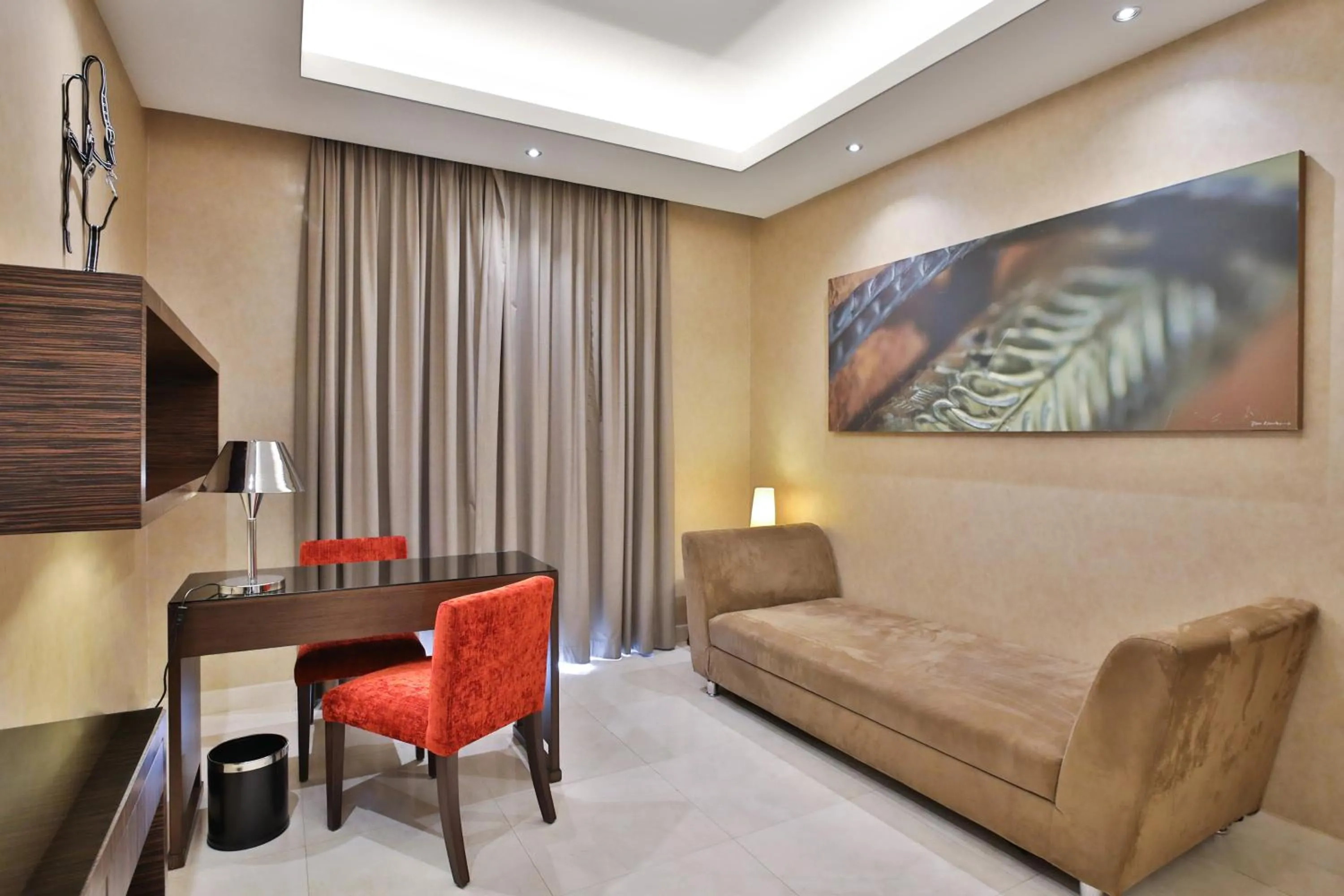 Living room in Meliá Desert Palm Member of Meliá Collection