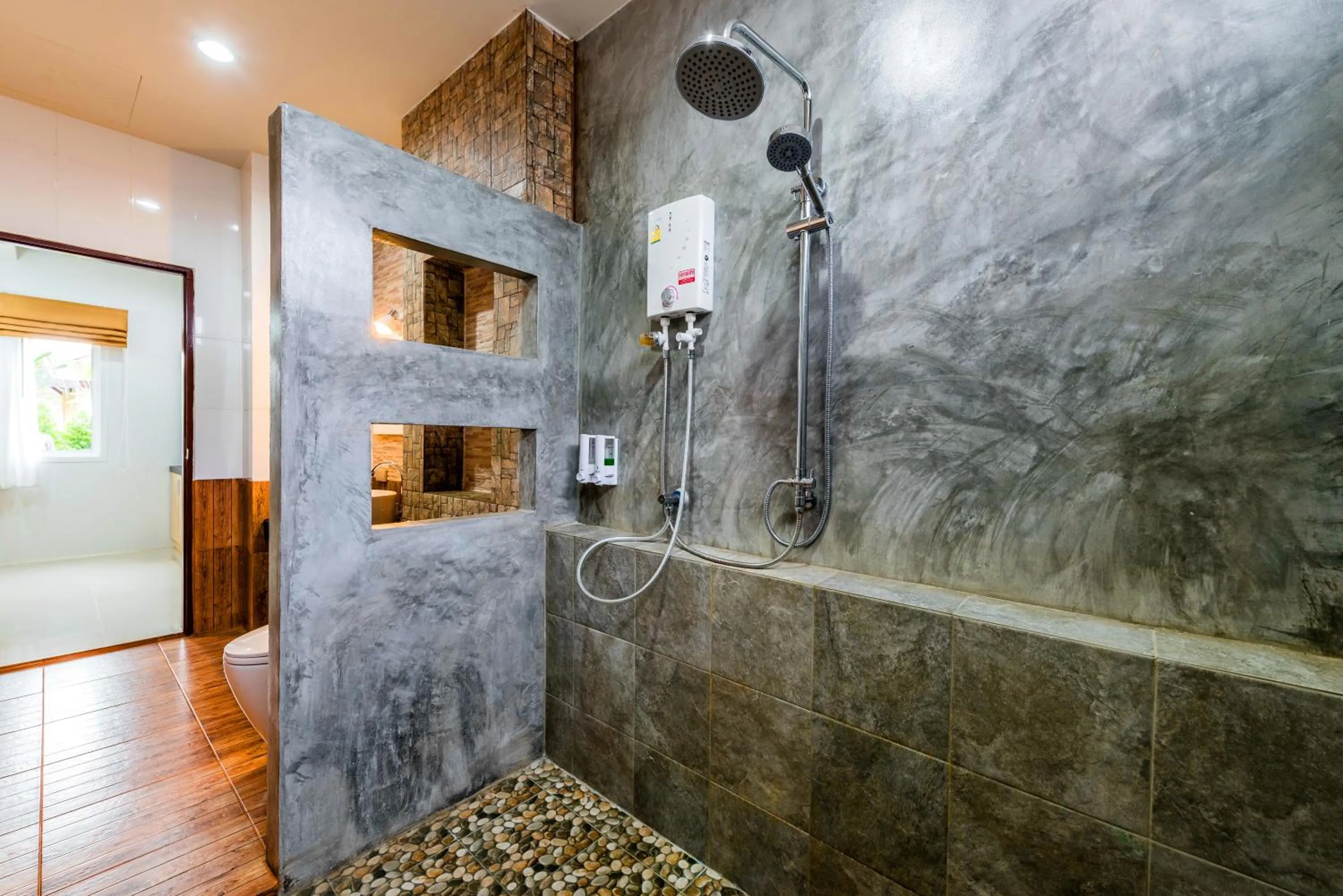 Bathroom in Phutara Lanta Resort - SHA Extra Plus Koh Lanta