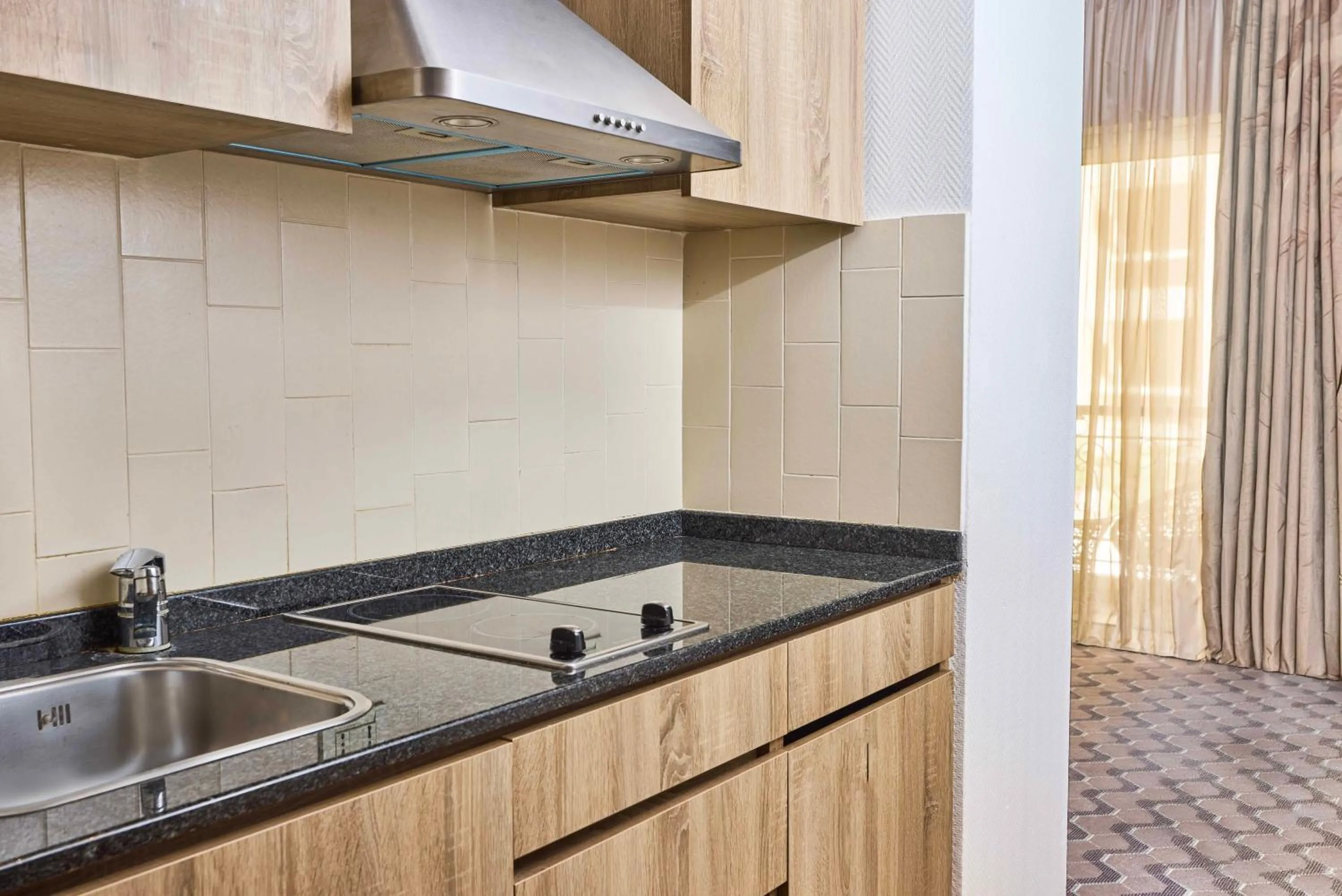 Kitchen or kitchenette in Gefinor Rotana – Beirut