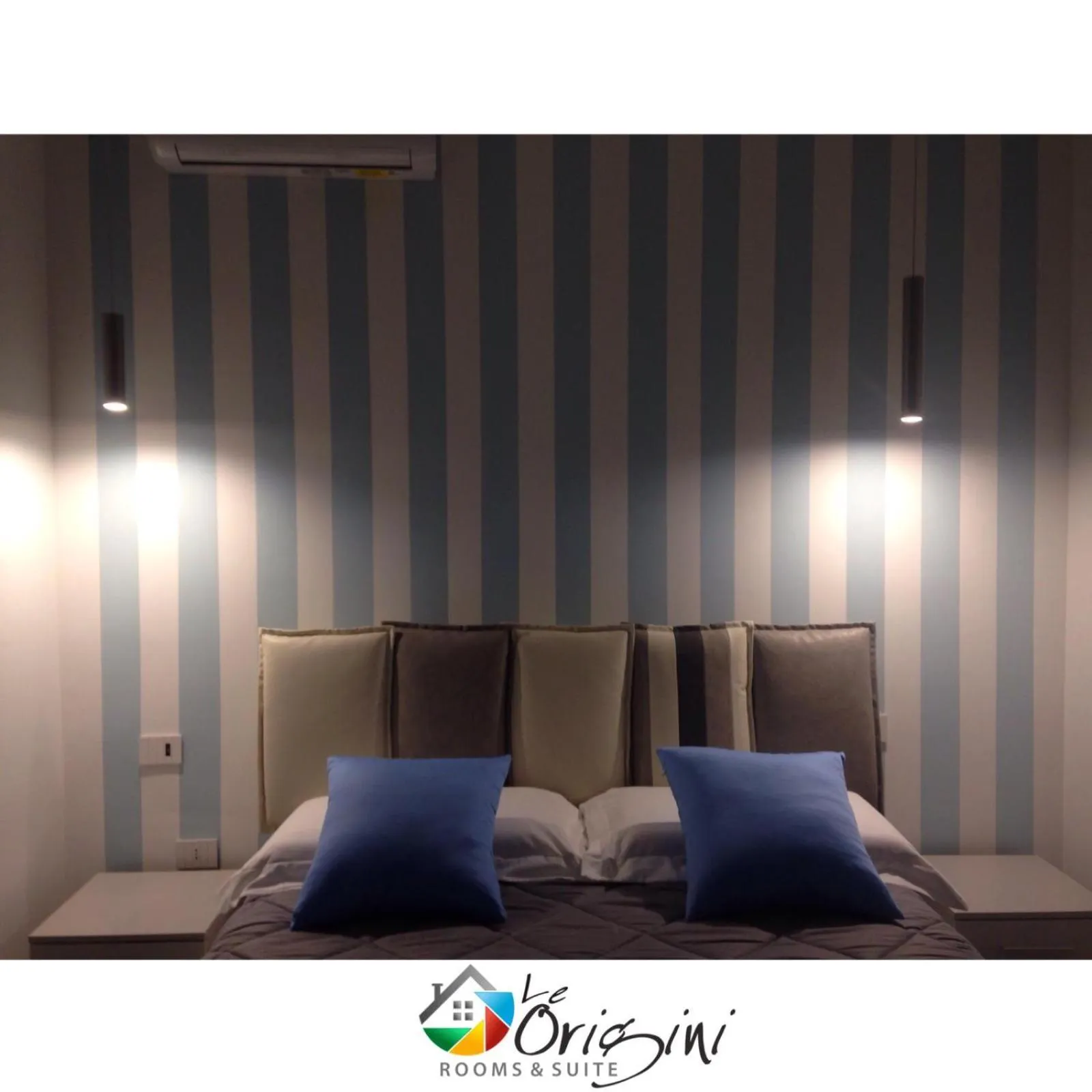 Bed in Le Origini Rooms&Suite