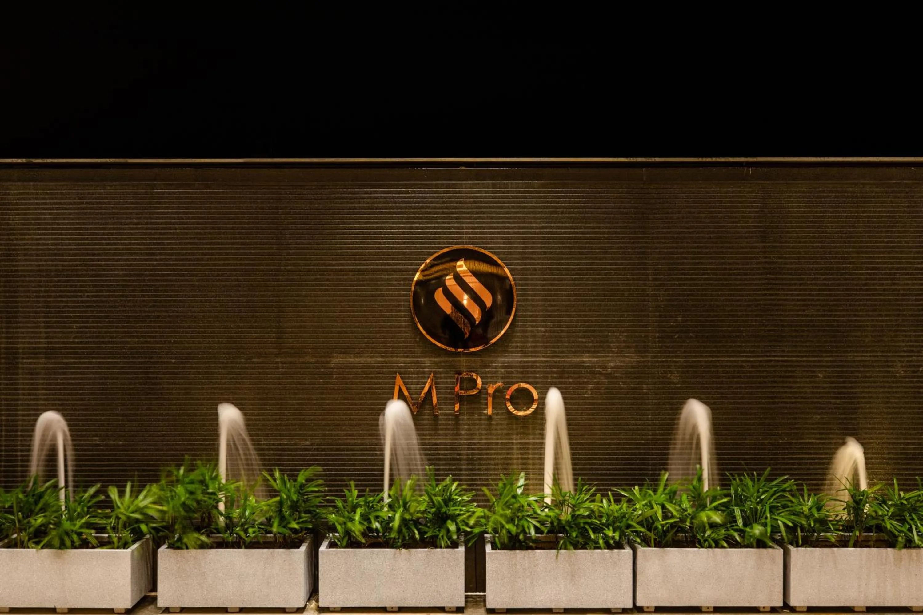 Property logo or sign in Hotel M Pro Palace Mysore - 12 Minutes to Mysore Palace