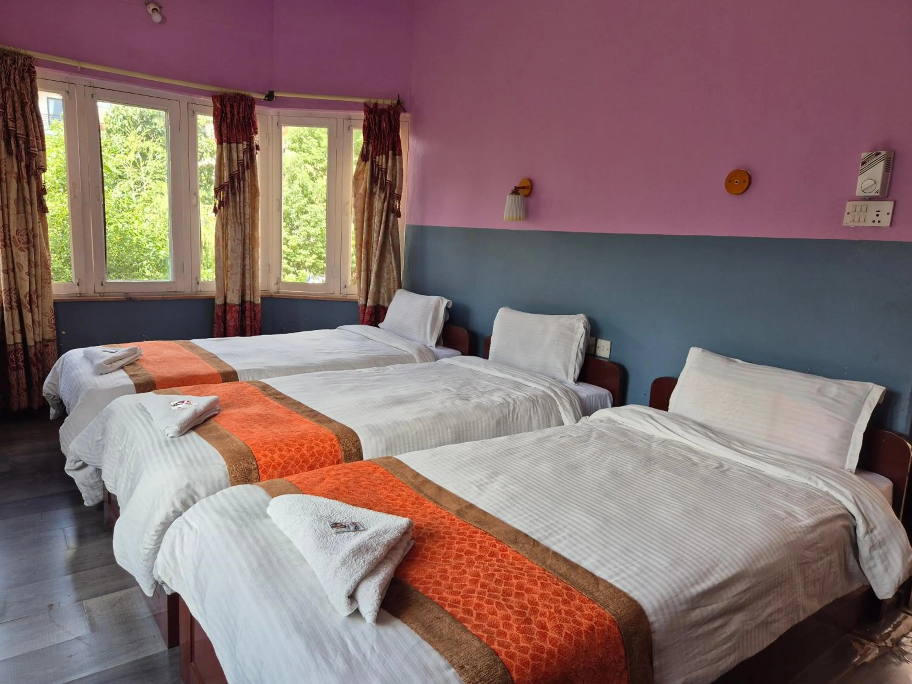 Bed in Hotel Fishtail Villa