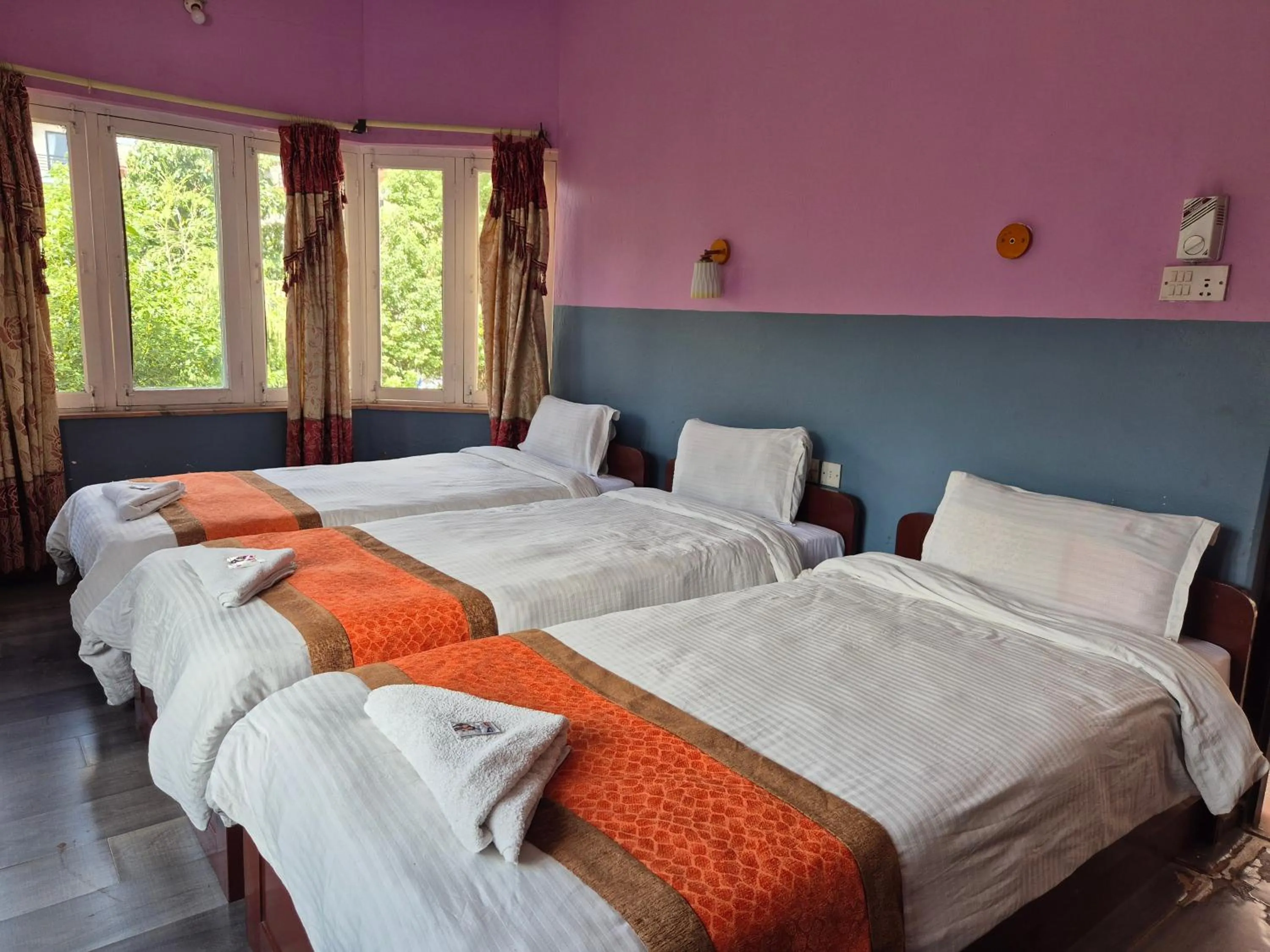 Bed in Hotel Fishtail Villa