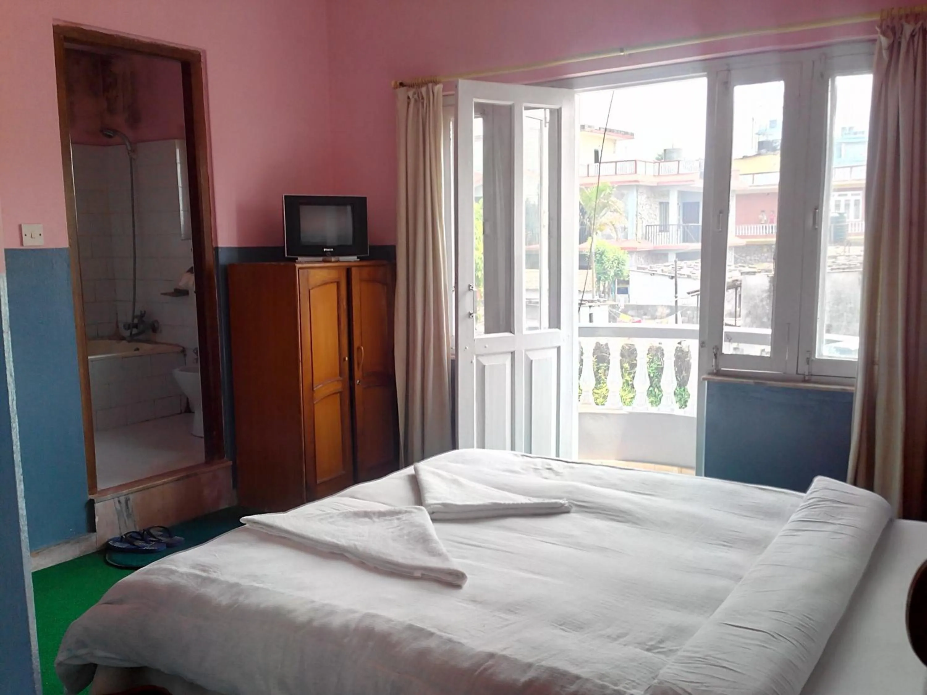 Bed in Hotel Fishtail Villa