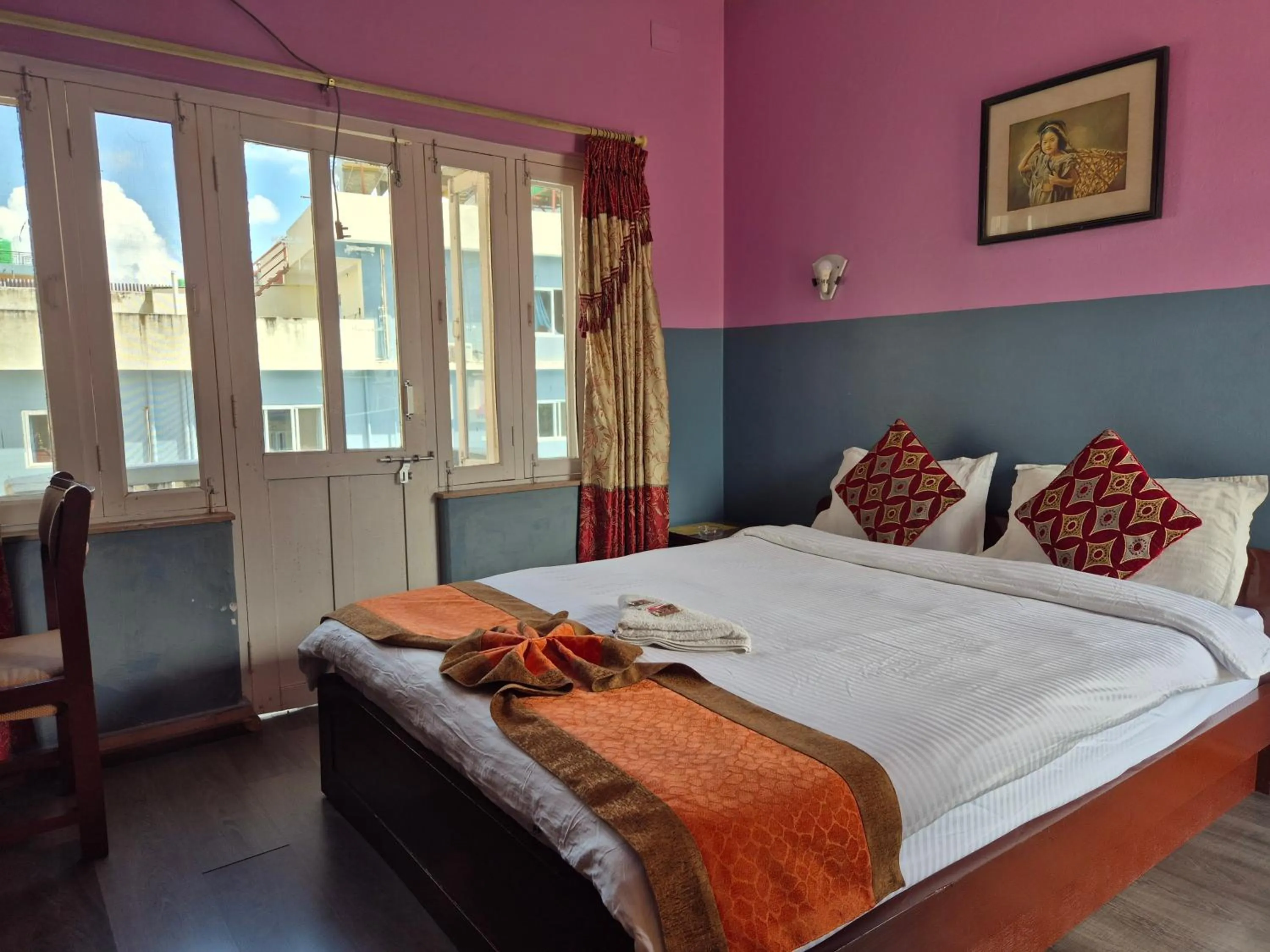 Bed in Hotel Fishtail Villa