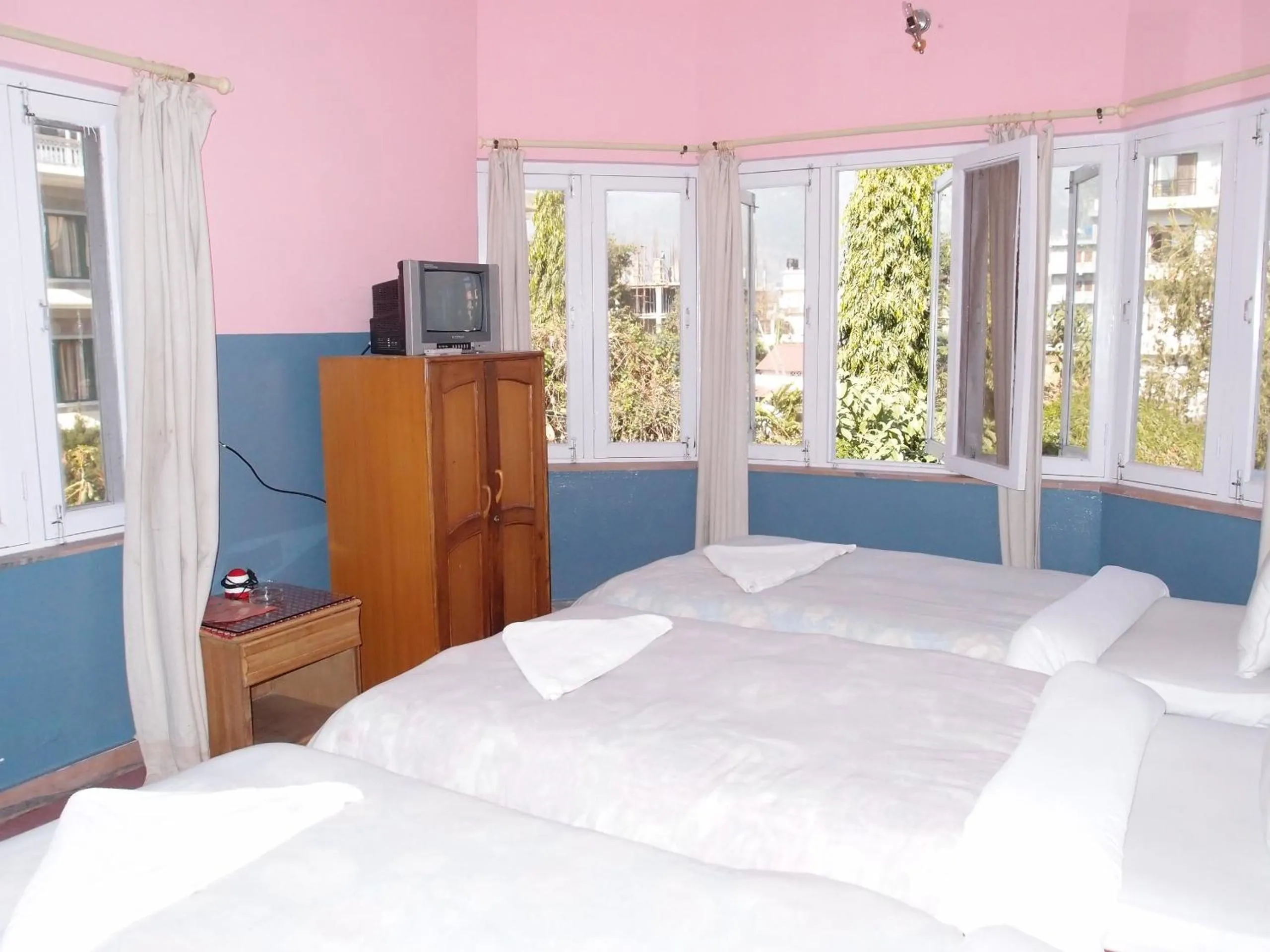 Bed in Hotel Fishtail Villa