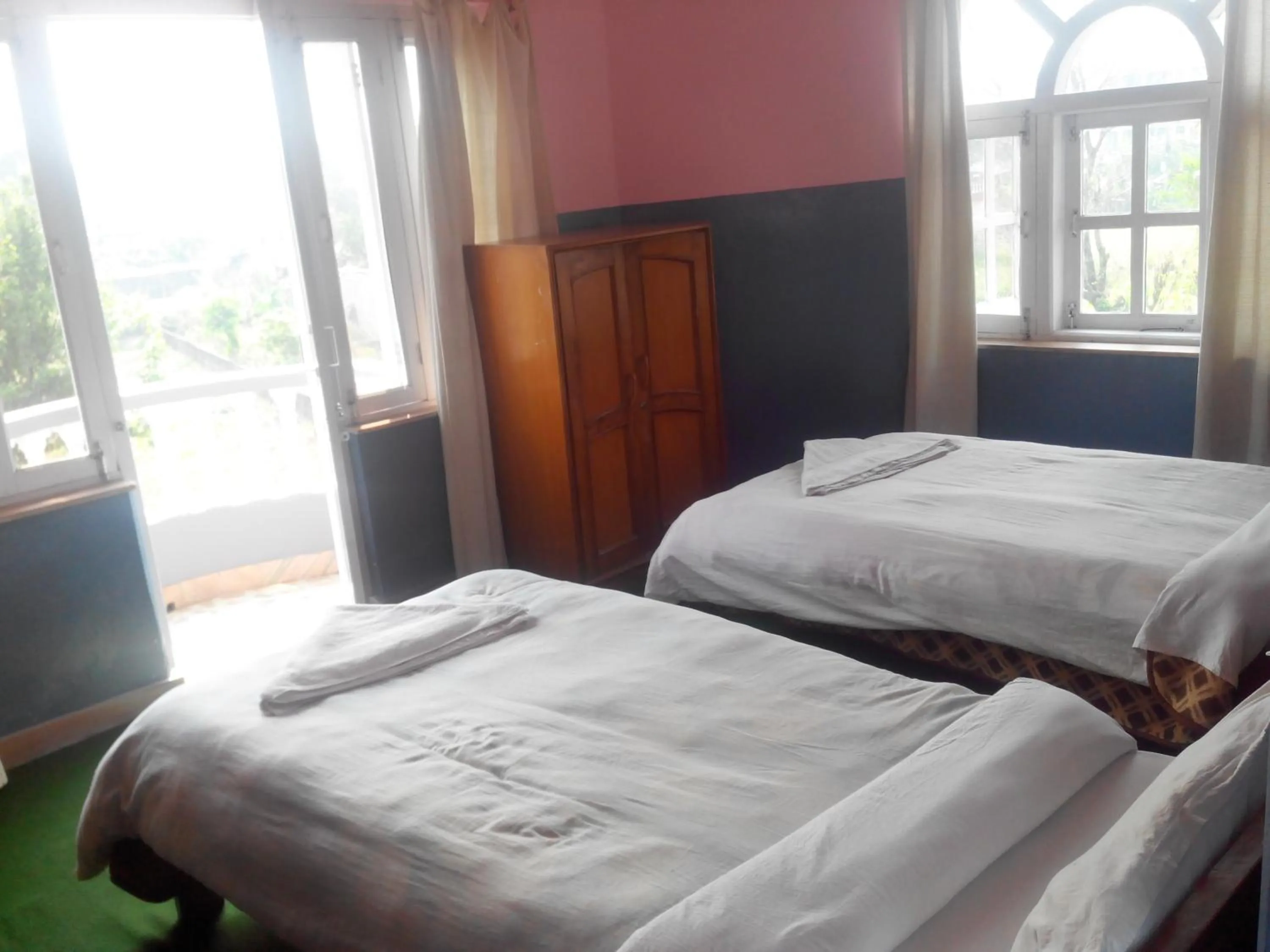 Bed in Hotel Fishtail Villa