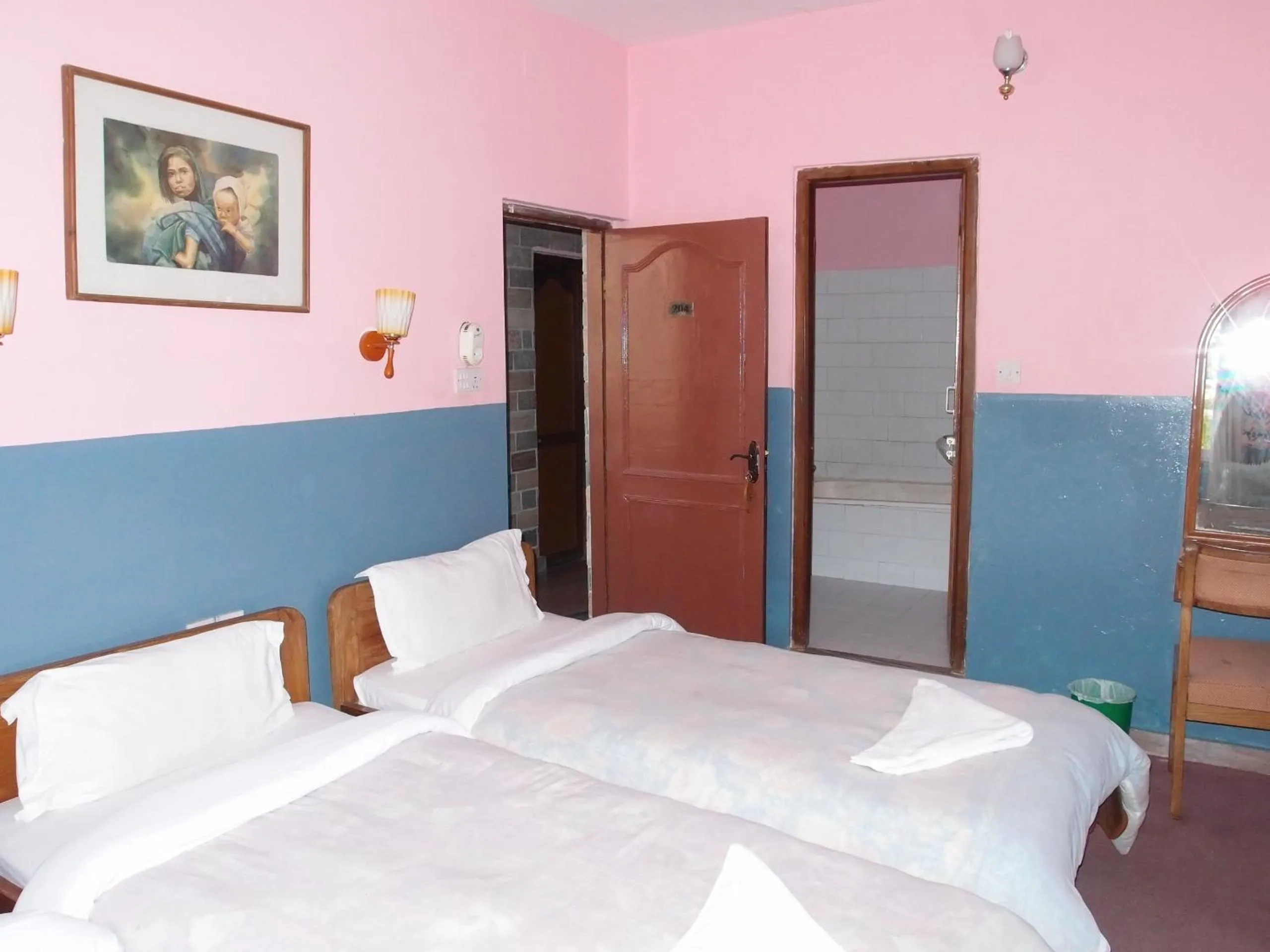 Bed in Hotel Fishtail Villa