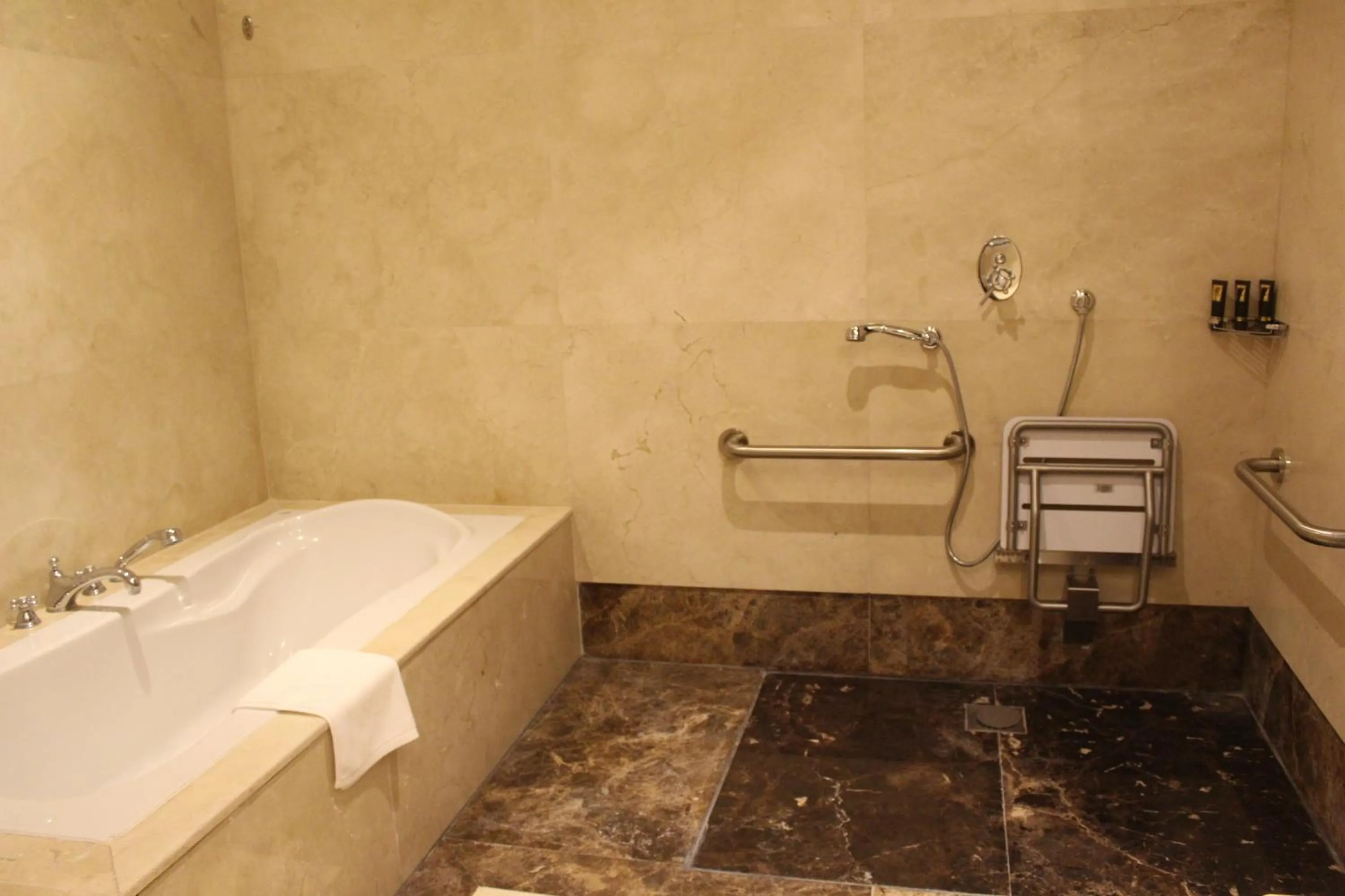 Bathroom in Grand Regency Doha, Trademark Collection by Wyndham