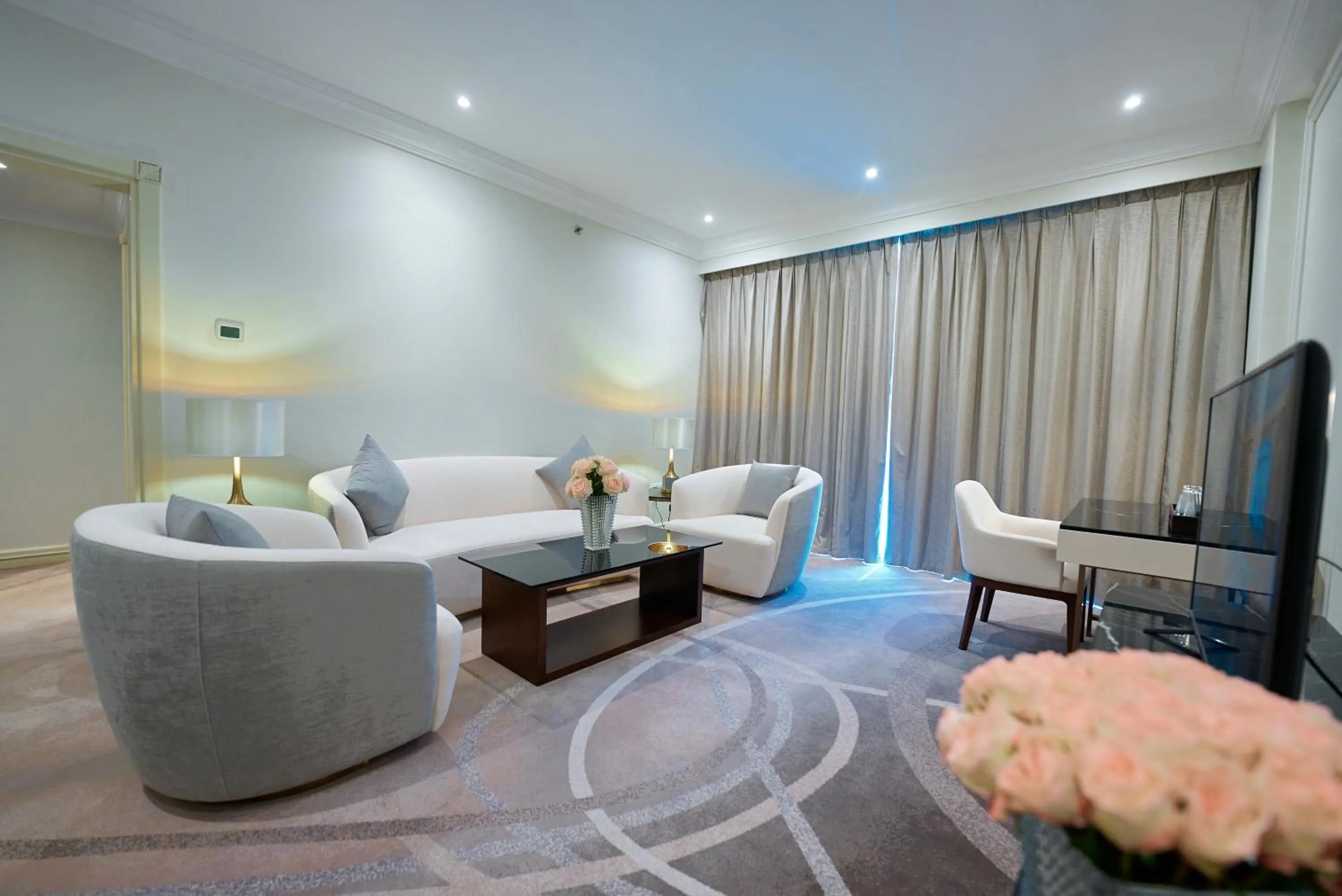 Living room in Grand Regency Doha, Trademark Collection by Wyndham