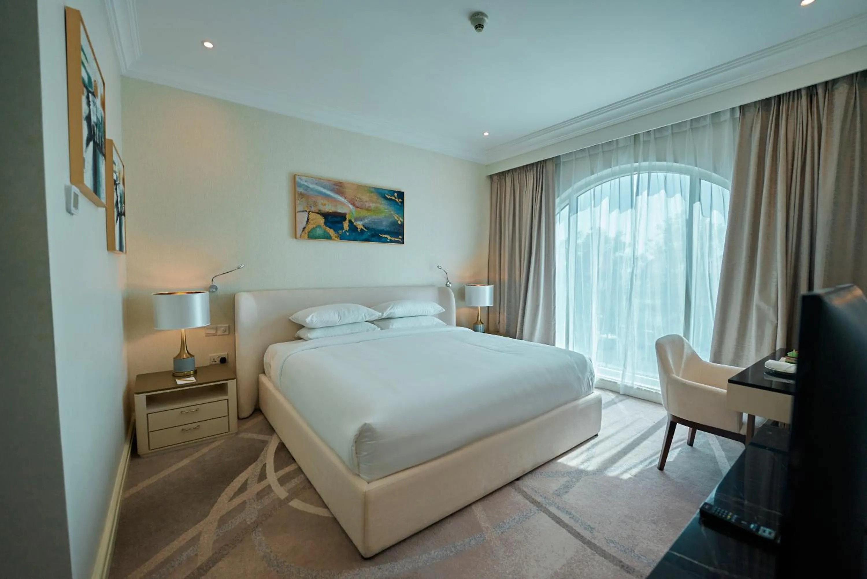 Photo of the whole room, Bed in Grand Regency Doha, Trademark Collection by Wyndham