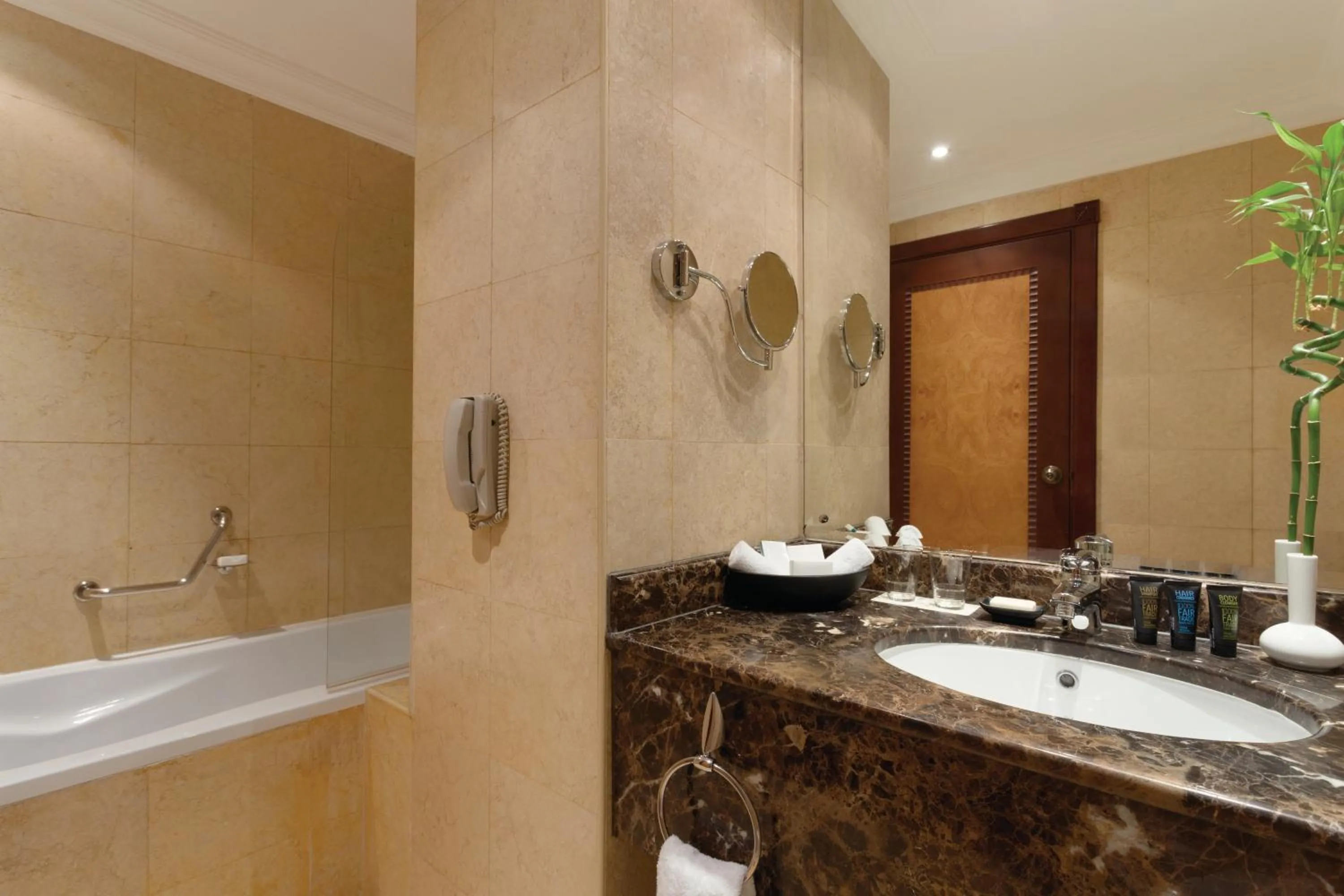 Toilet in Grand Regency Doha, Trademark Collection by Wyndham