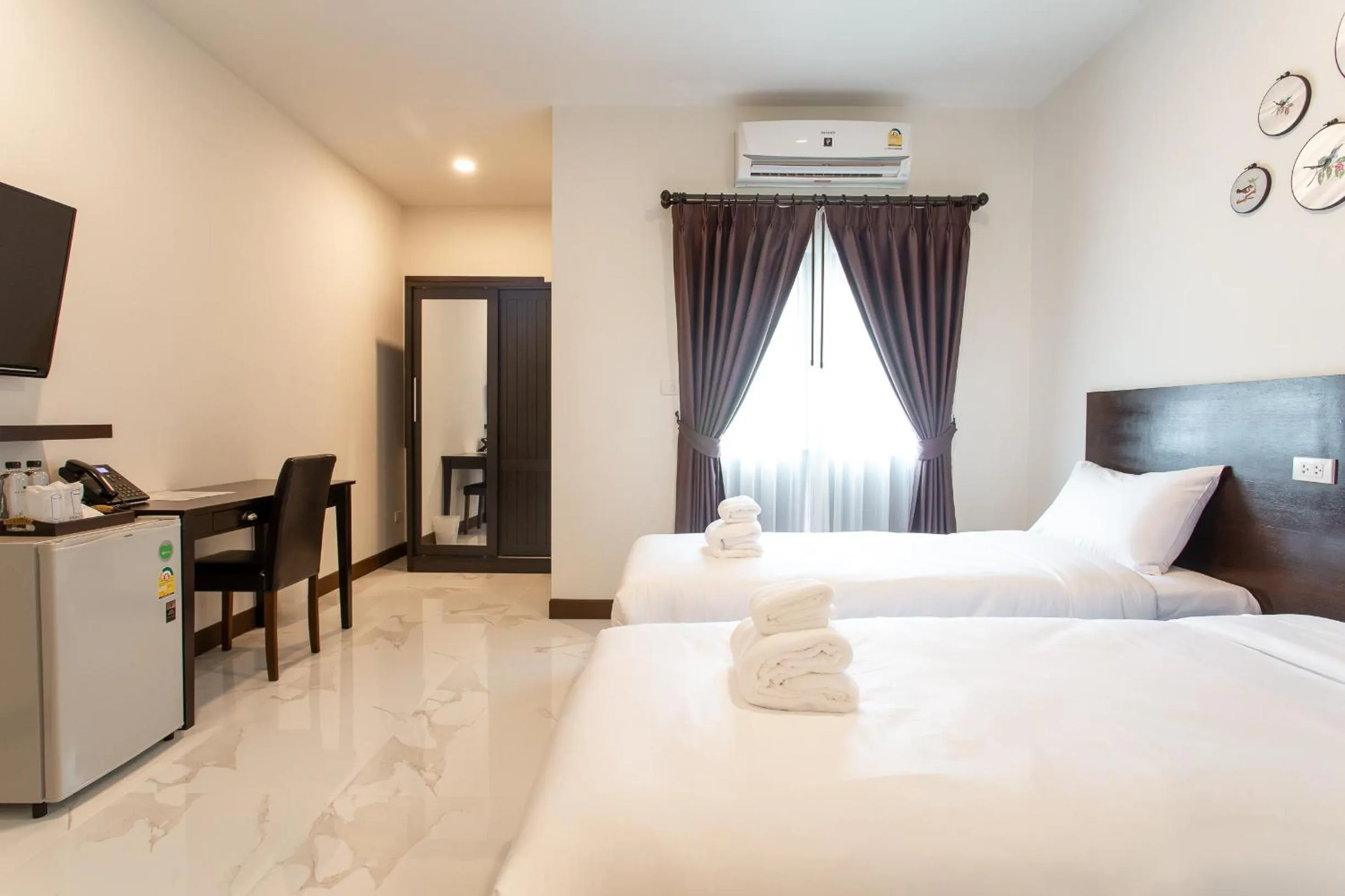 Bed in Khampare Chiang Mai Hotel