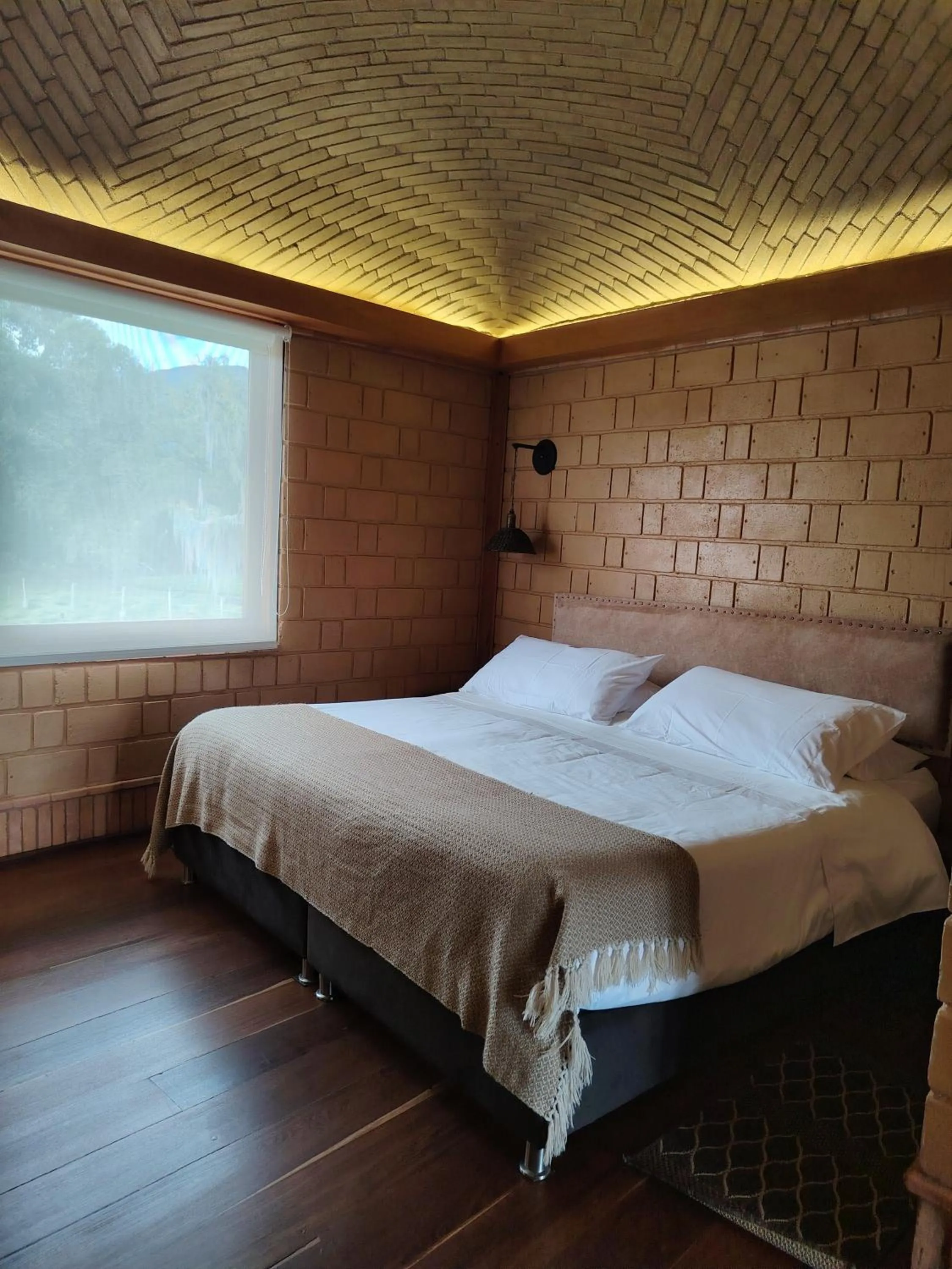 Bed in La Alhambra Hotel Boutique