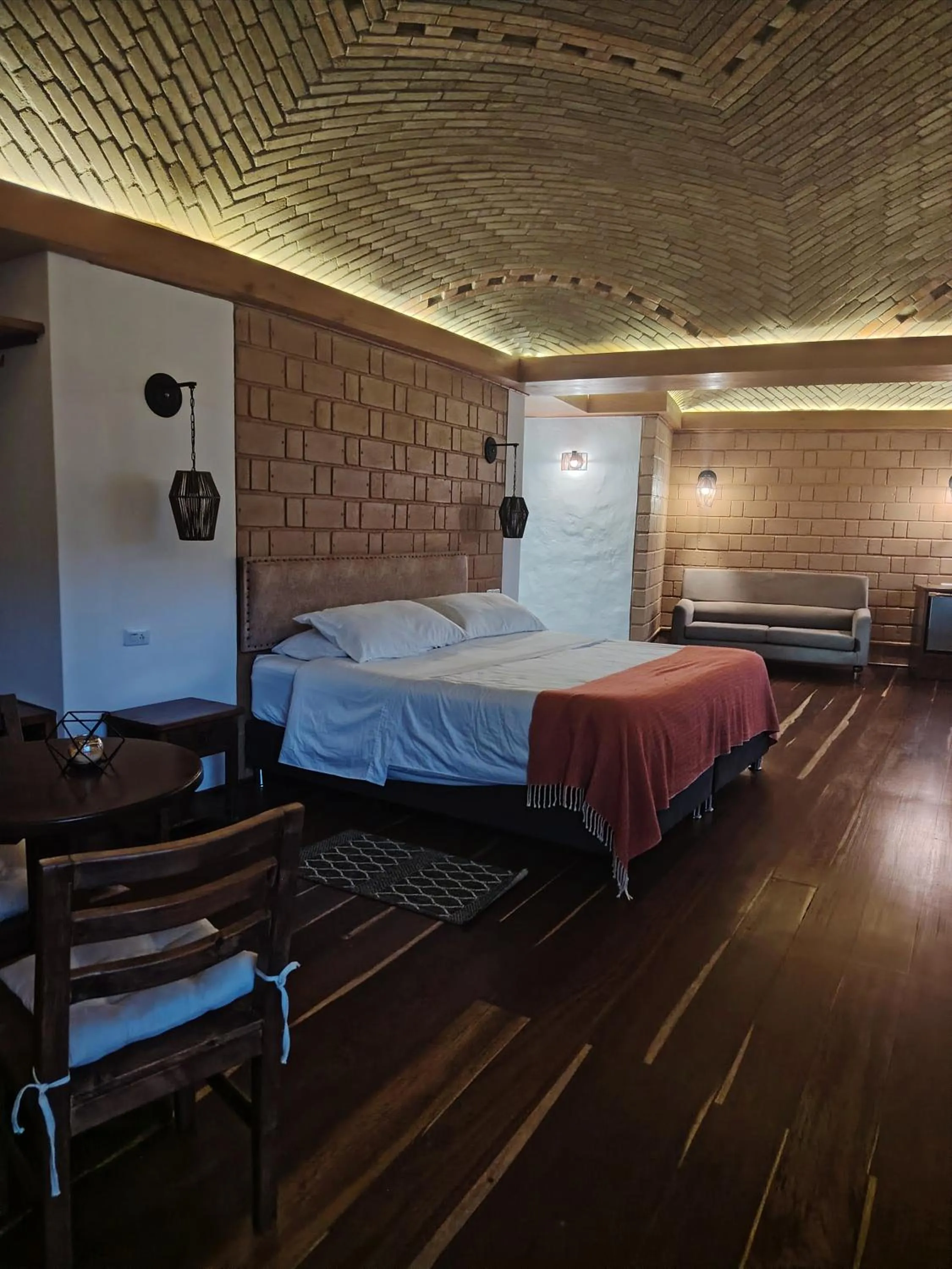 Bed in La Alhambra Hotel Boutique