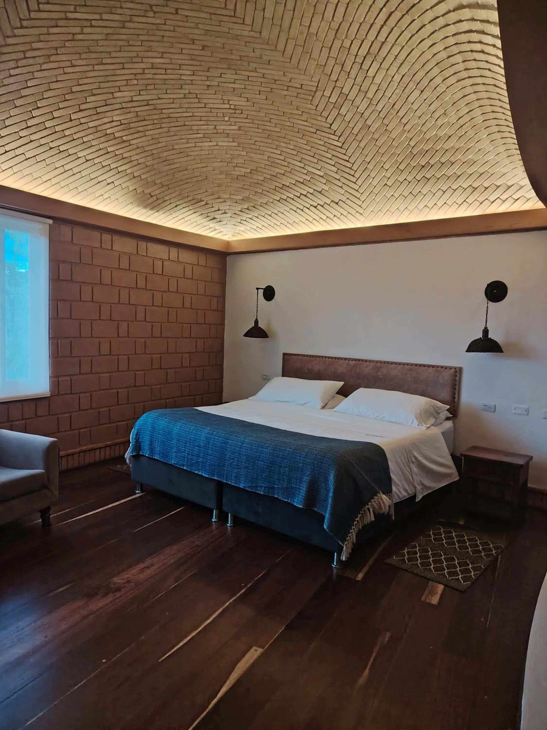Bed in La Alhambra Hotel Boutique