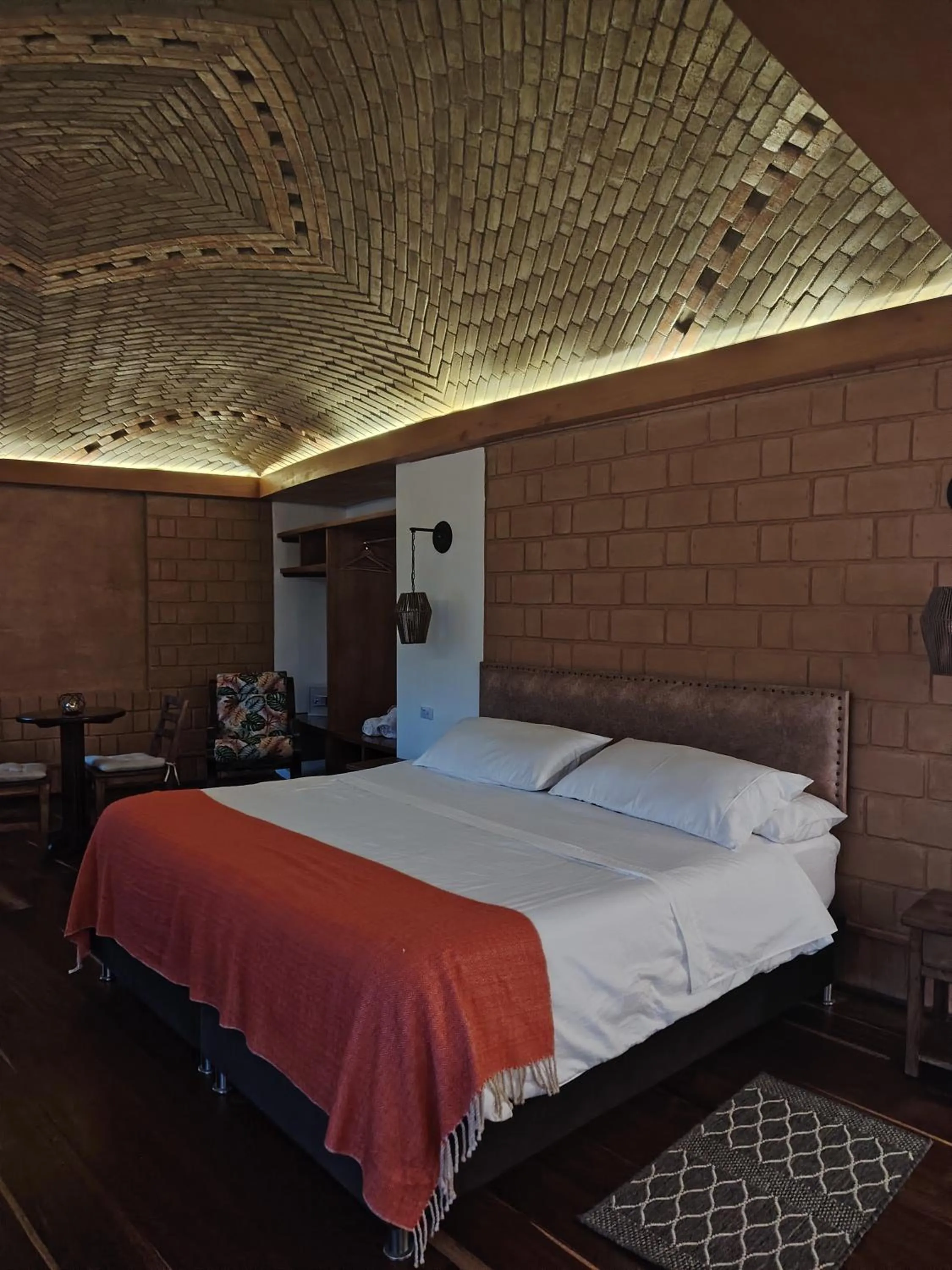 Bed in La Alhambra Hotel Boutique