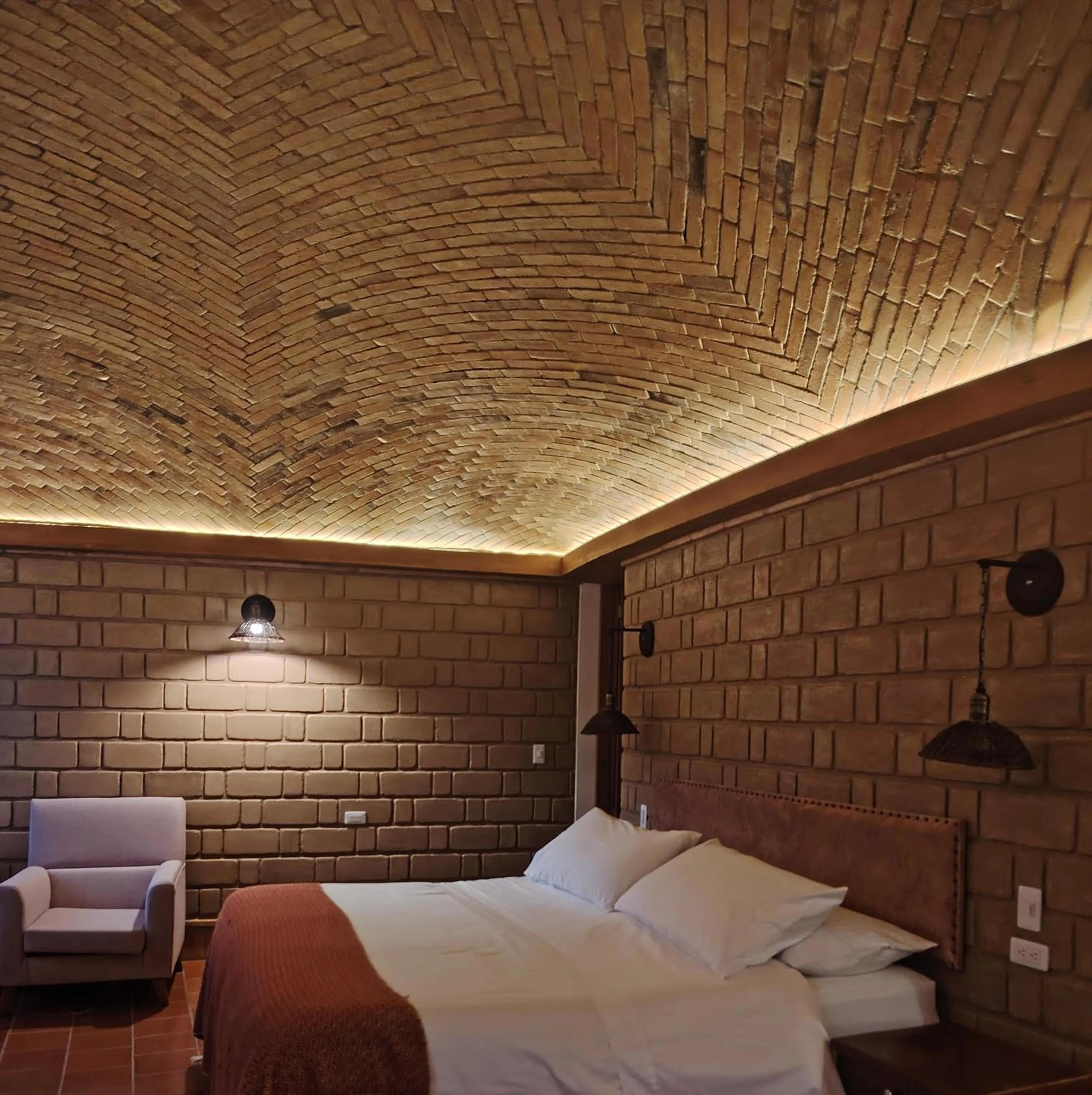 Bed in La Alhambra Hotel Boutique