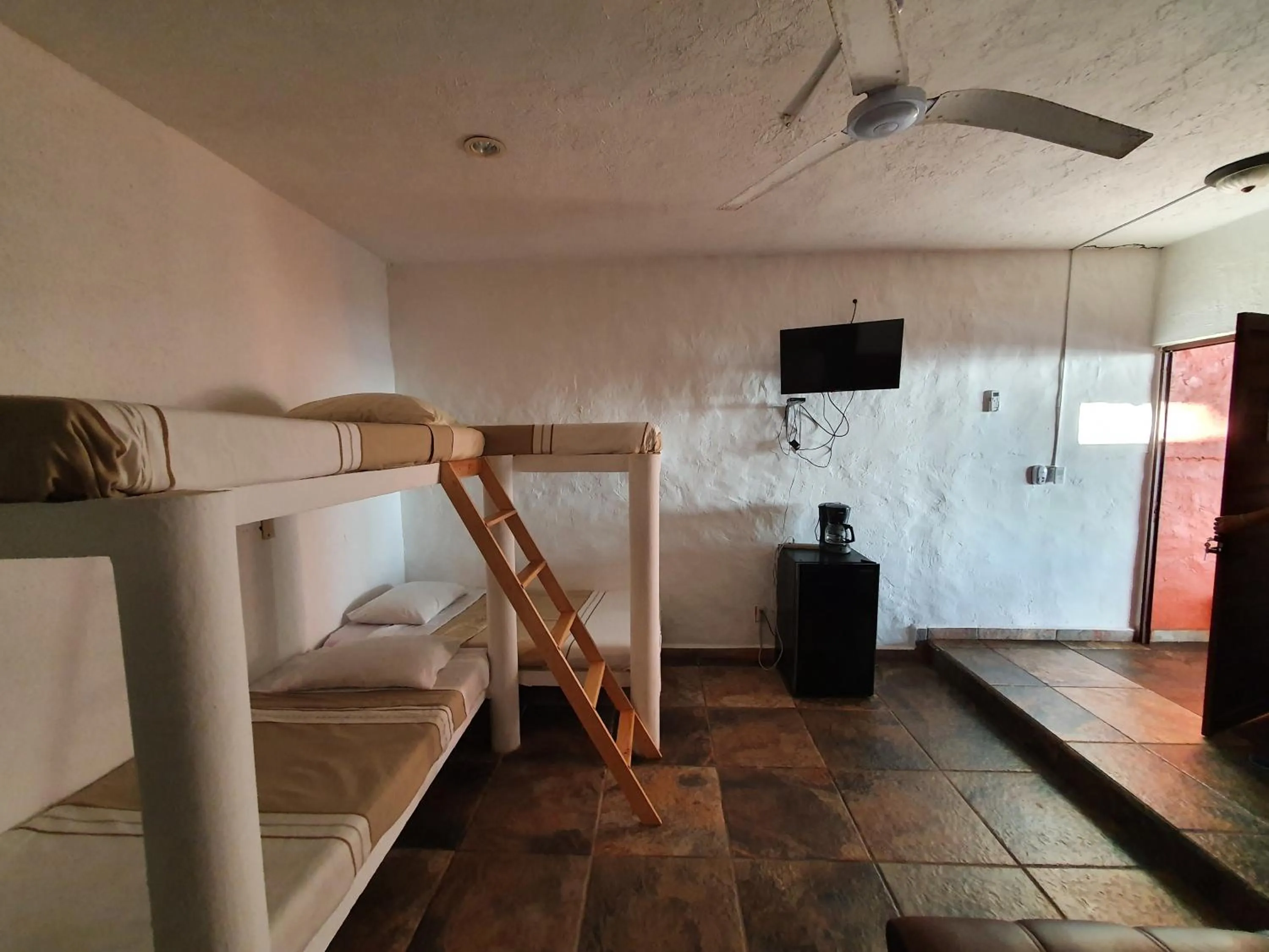 Bed in Bungalows La Perla Playa Azul