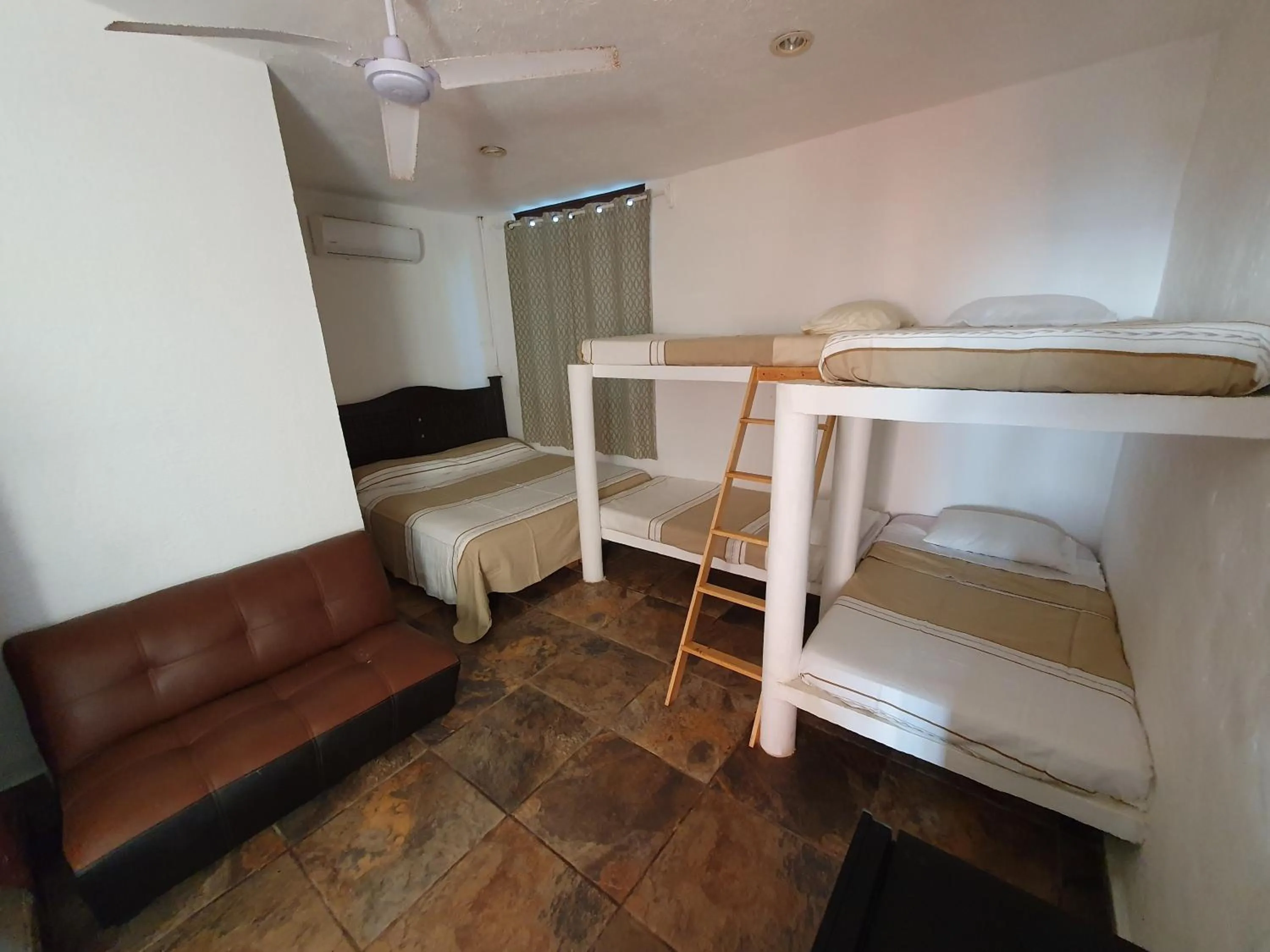 Bed in Bungalows La Perla Playa Azul